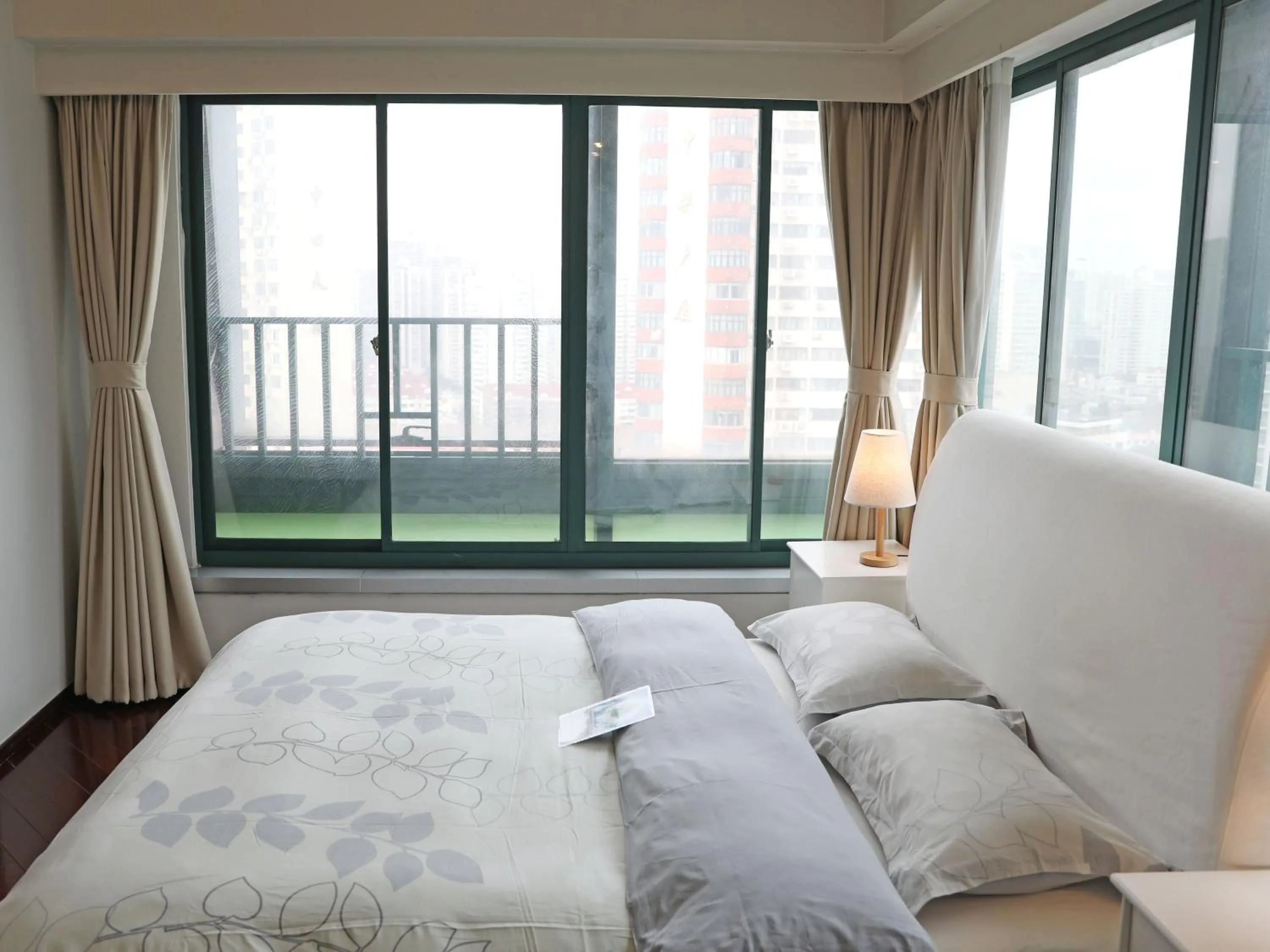 Bed in Shanghai Cosmo World Union Service Apartment