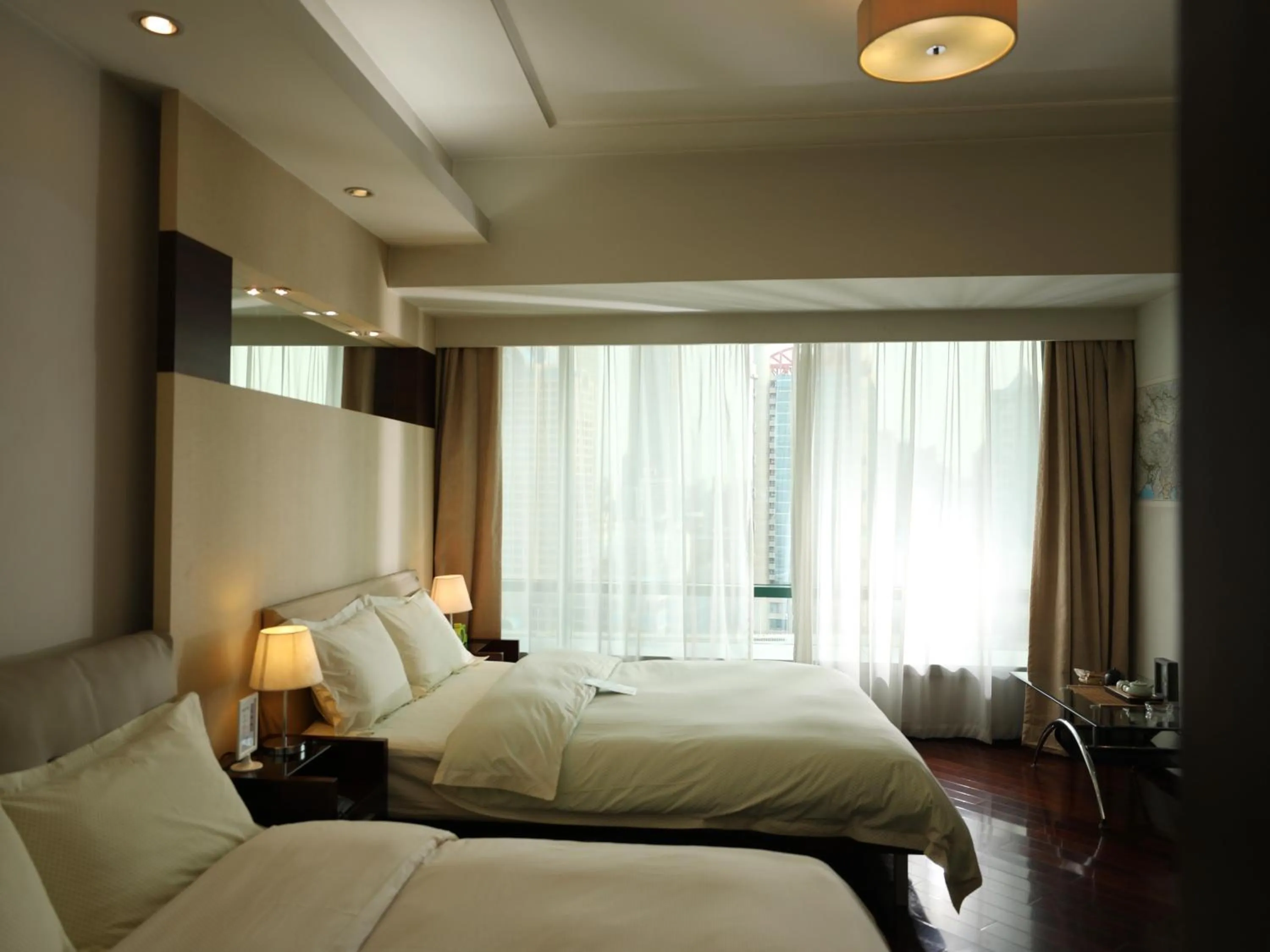 Bed in Shanghai Cosmo World Union Service Apartment