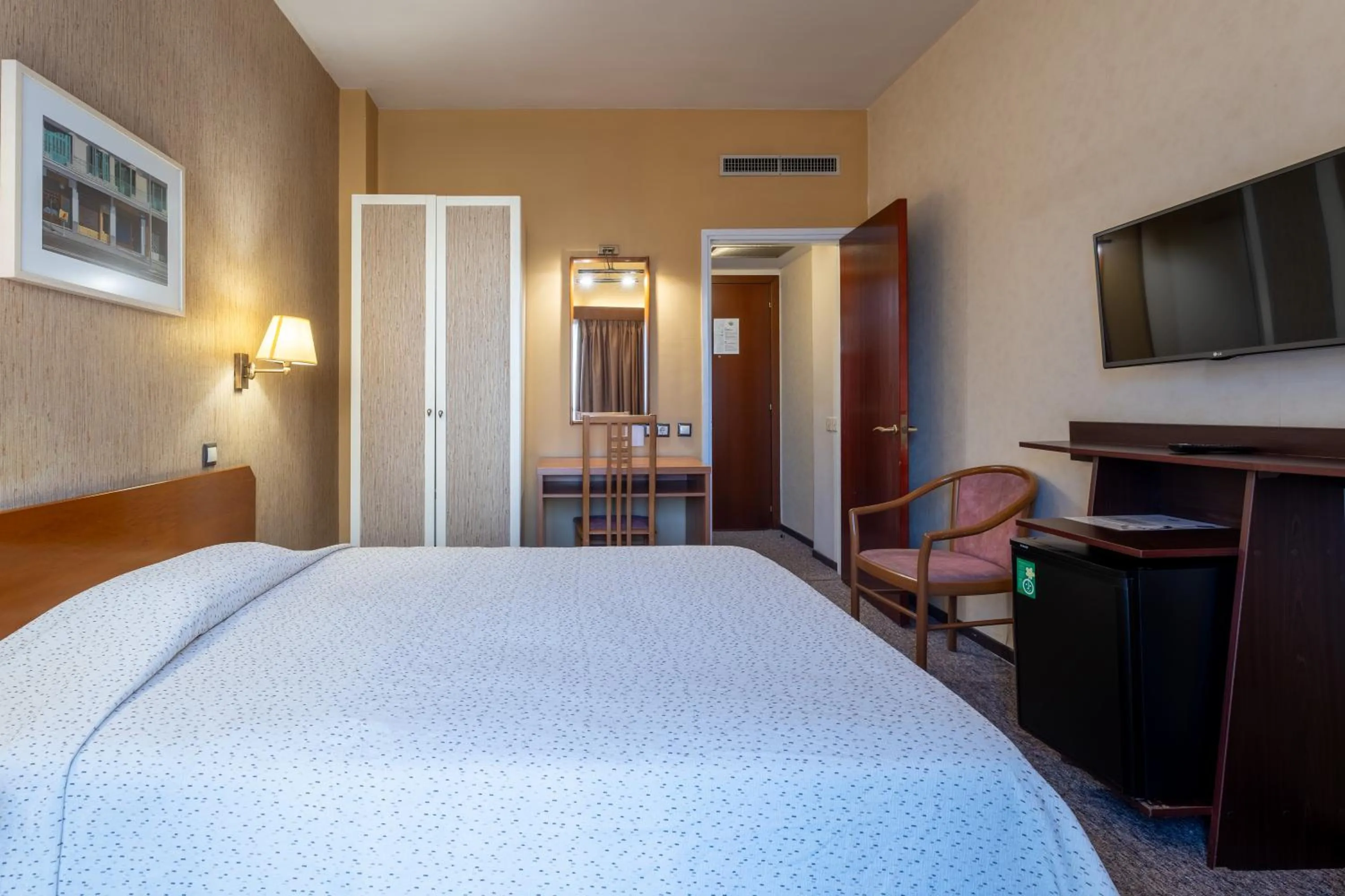 Bed in Queen Olga Hotel