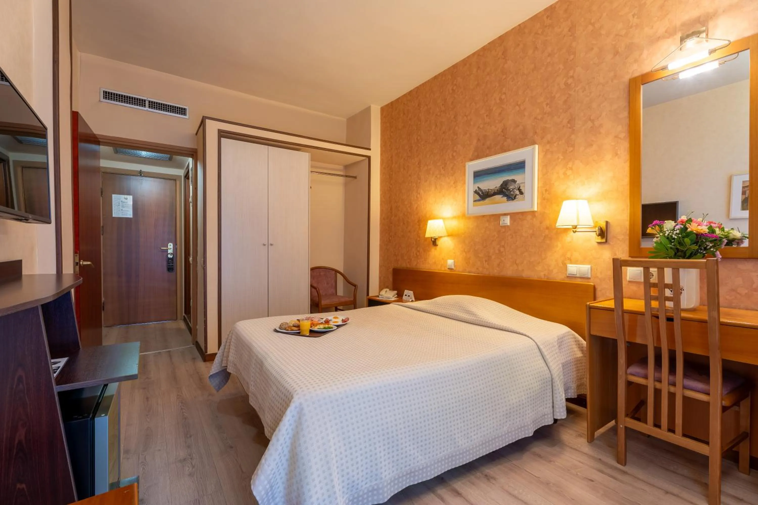 Bed in Queen Olga Hotel