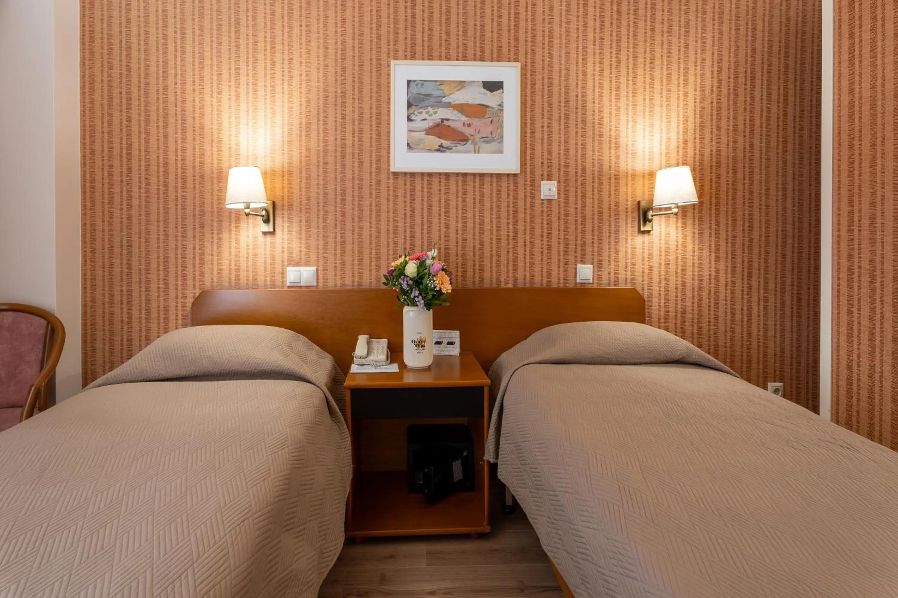 Bed in Queen Olga Hotel