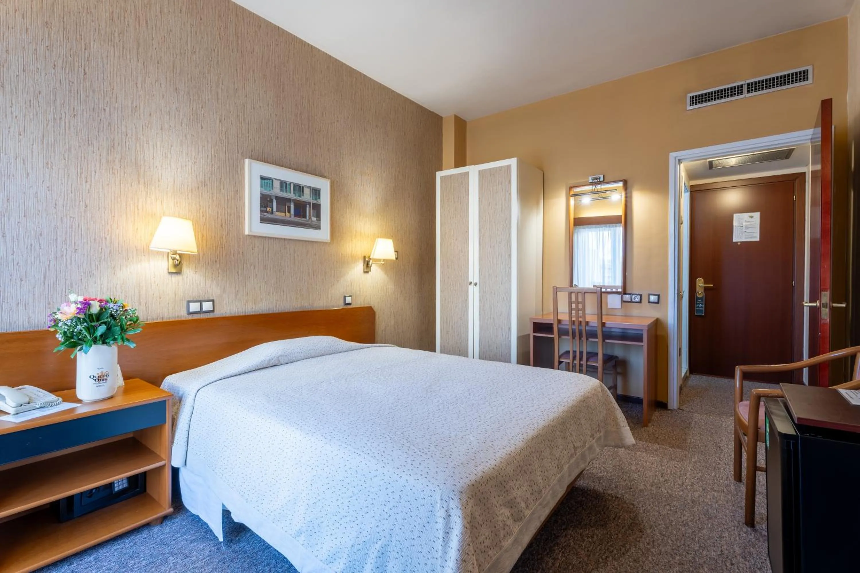 Bed in Queen Olga Hotel