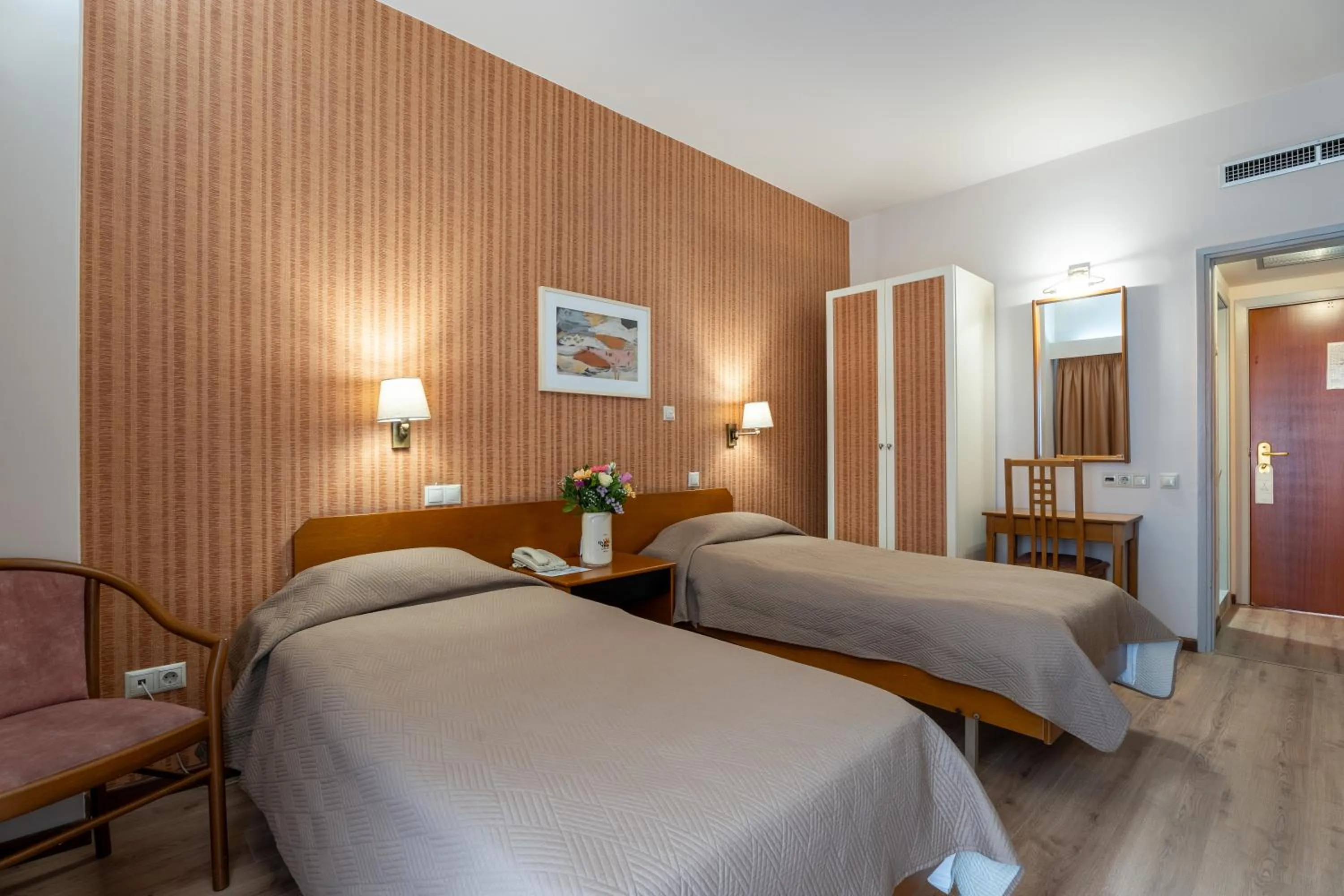 Bed in Queen Olga Hotel