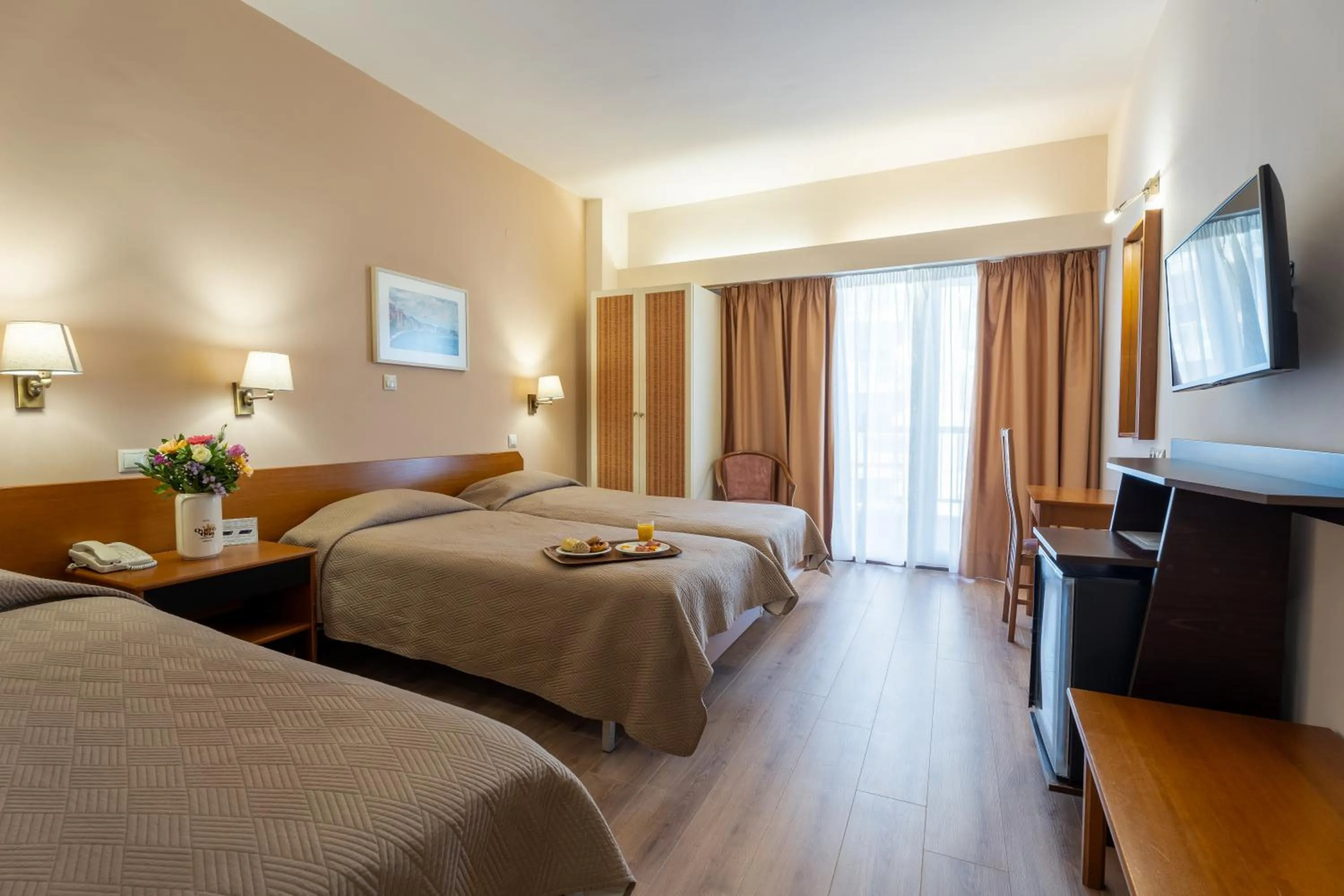 Bed in Queen Olga Hotel