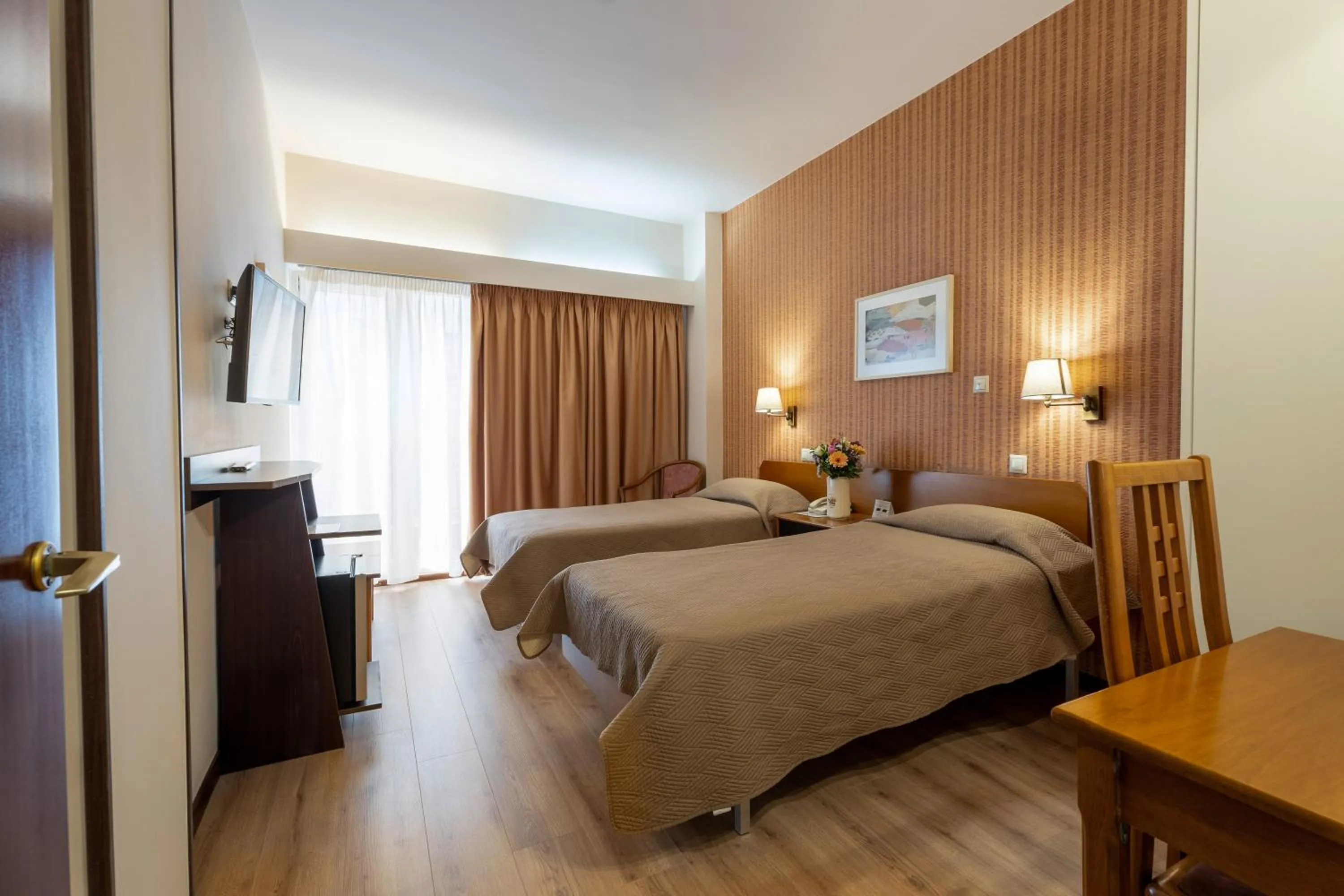 Bed in Queen Olga Hotel