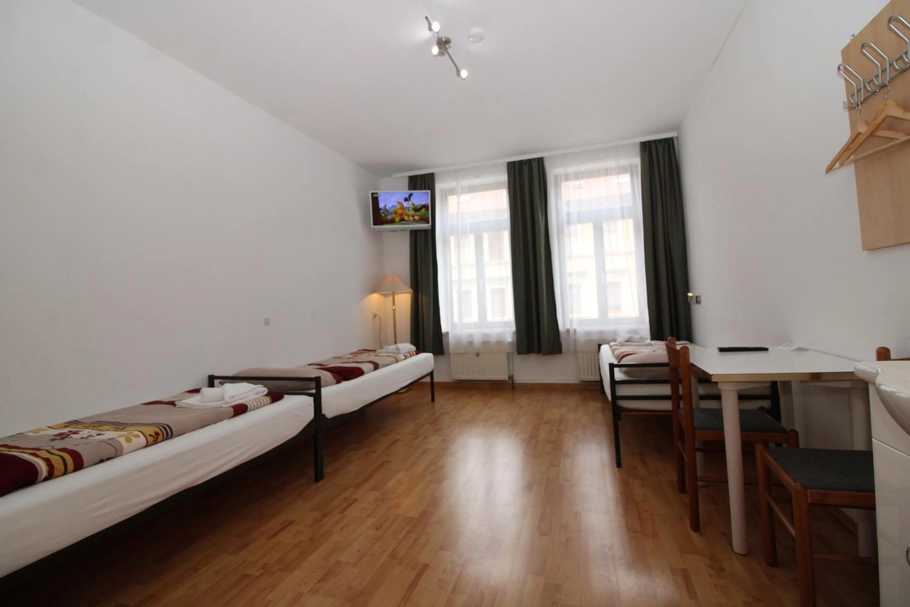 Photo of the whole room, Bed in Space Hotel im Campus der JvP Schule