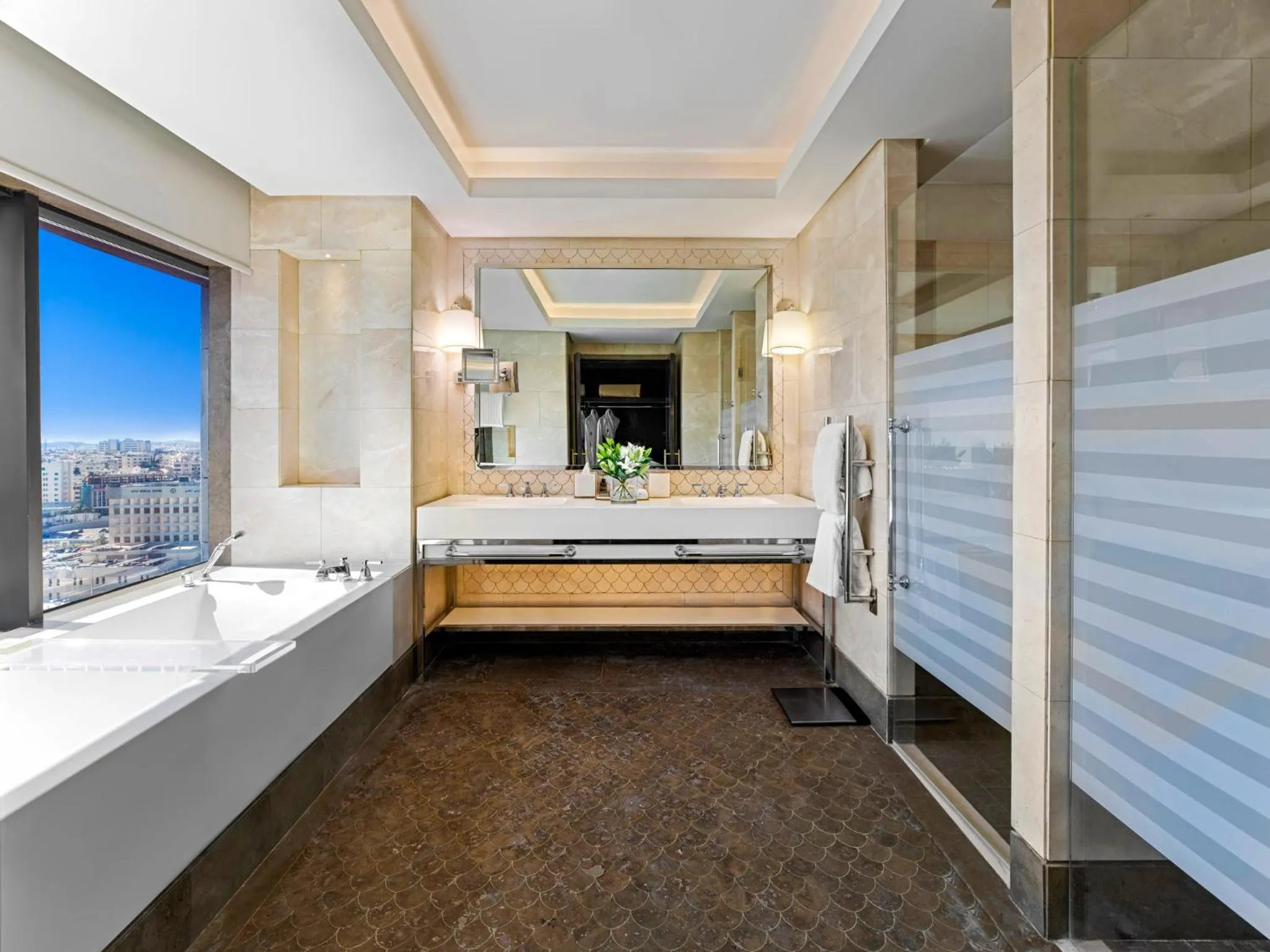 Bathroom, Bed in Fairmont Amman