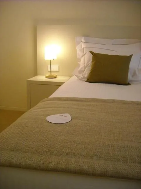 Bed in INLIMA Hotel & Spa