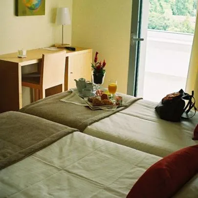 Bed in INLIMA Hotel & Spa