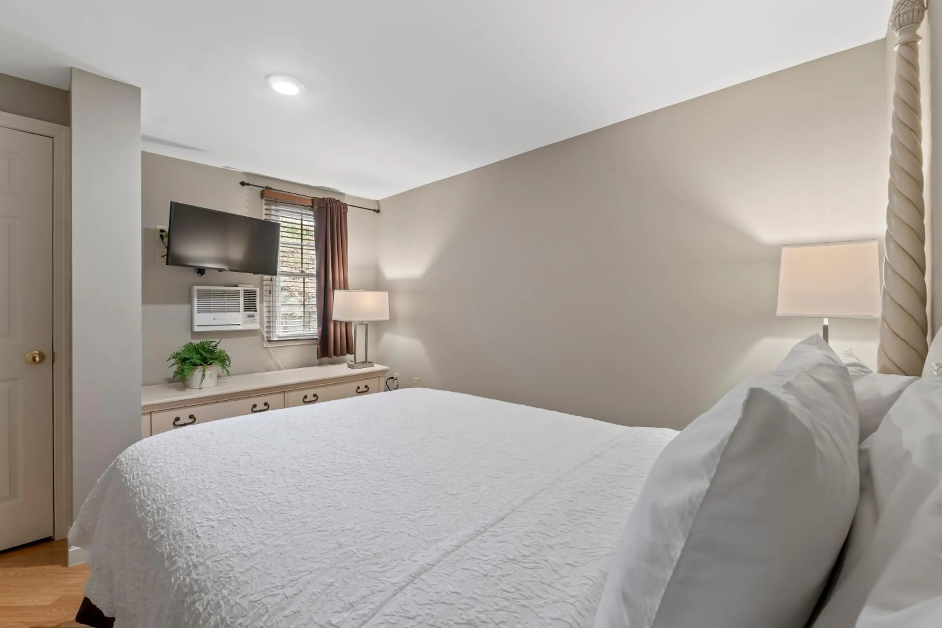 Bed in Sea Rose Suites