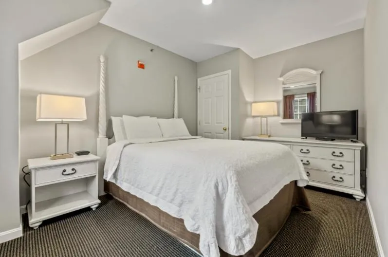 Bed in Sea Rose Suites