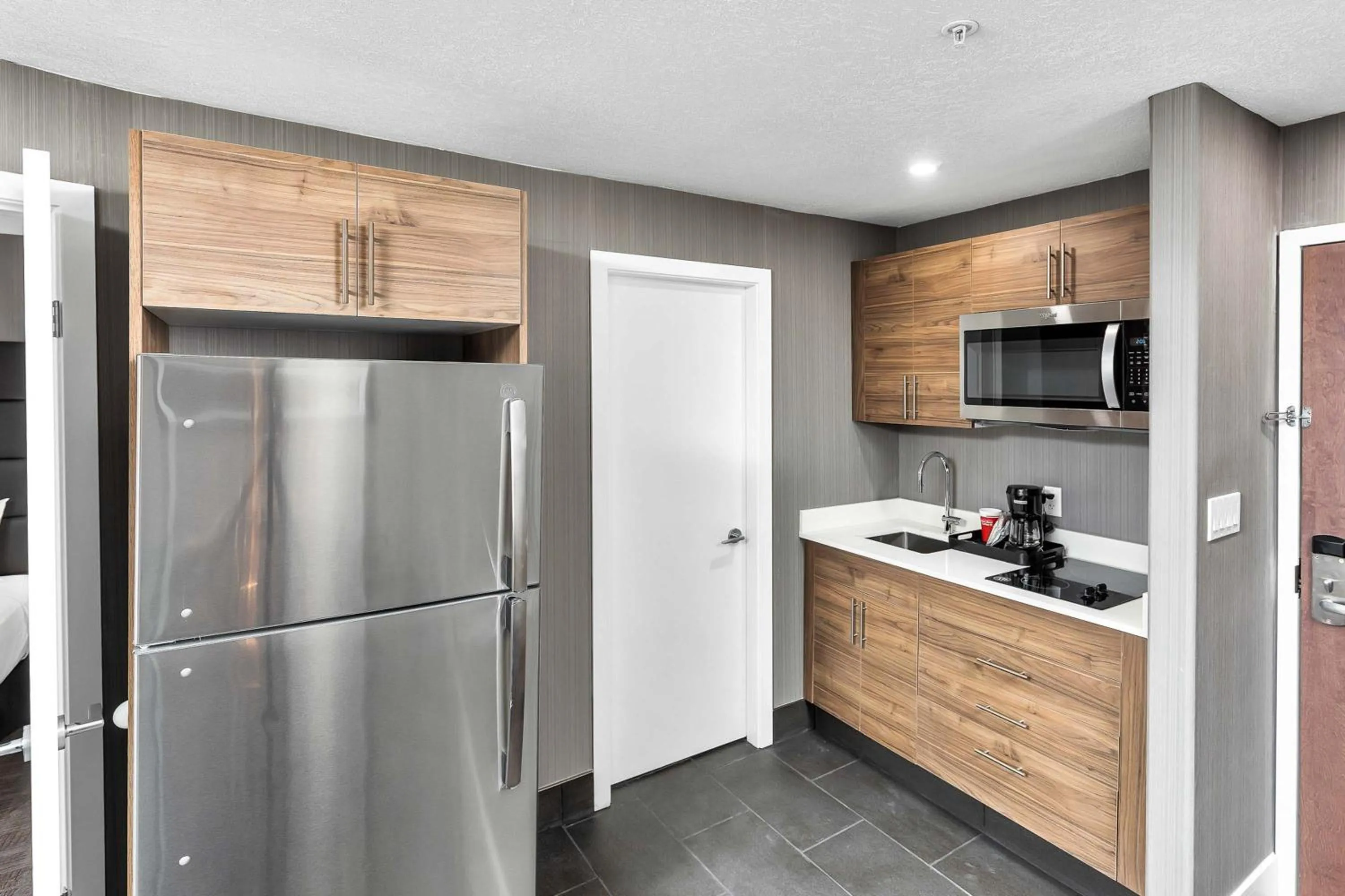 Kitchen or kitchenette in Sandman Hotel Grande Prairie