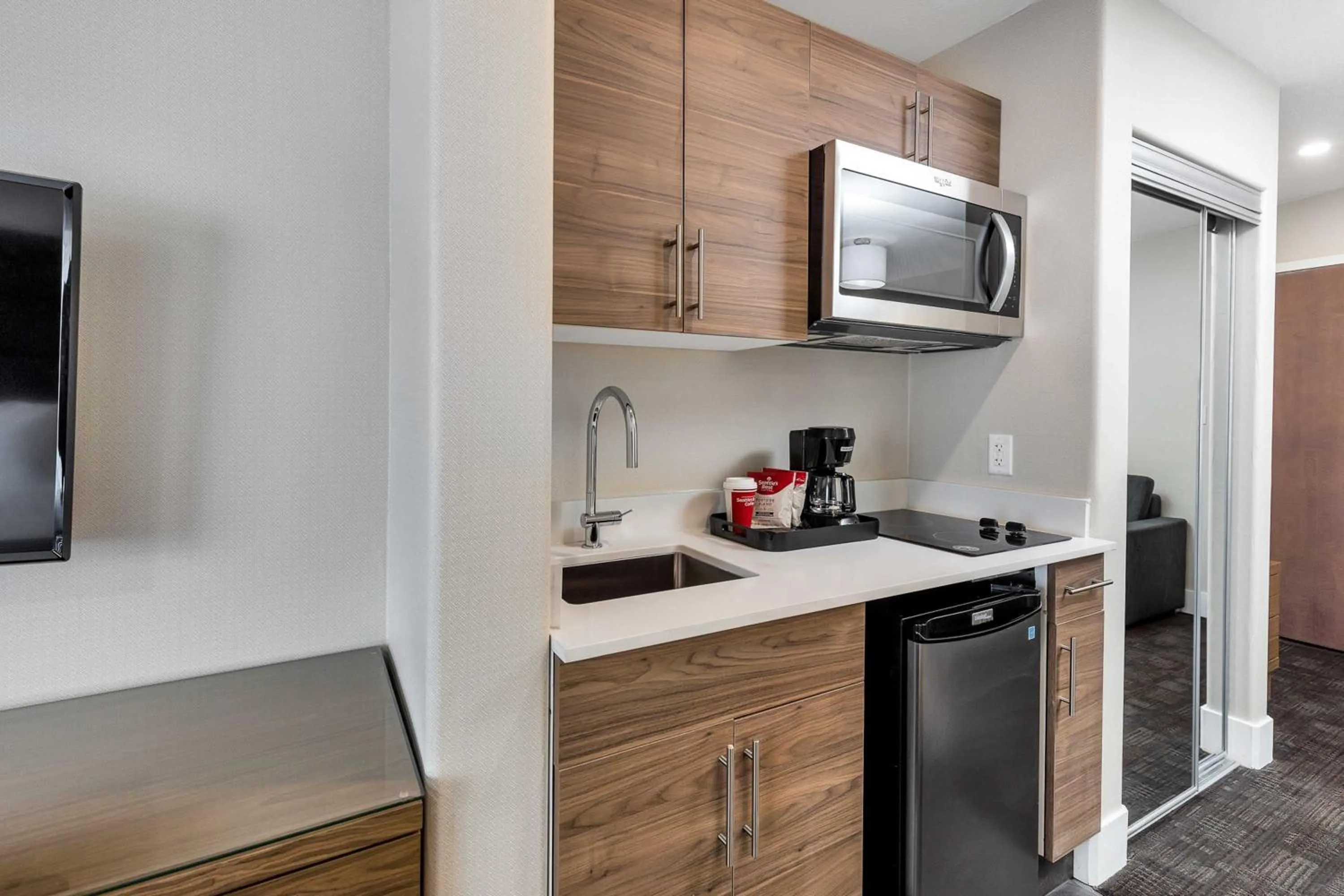 Kitchen or kitchenette in Sandman Hotel Grande Prairie