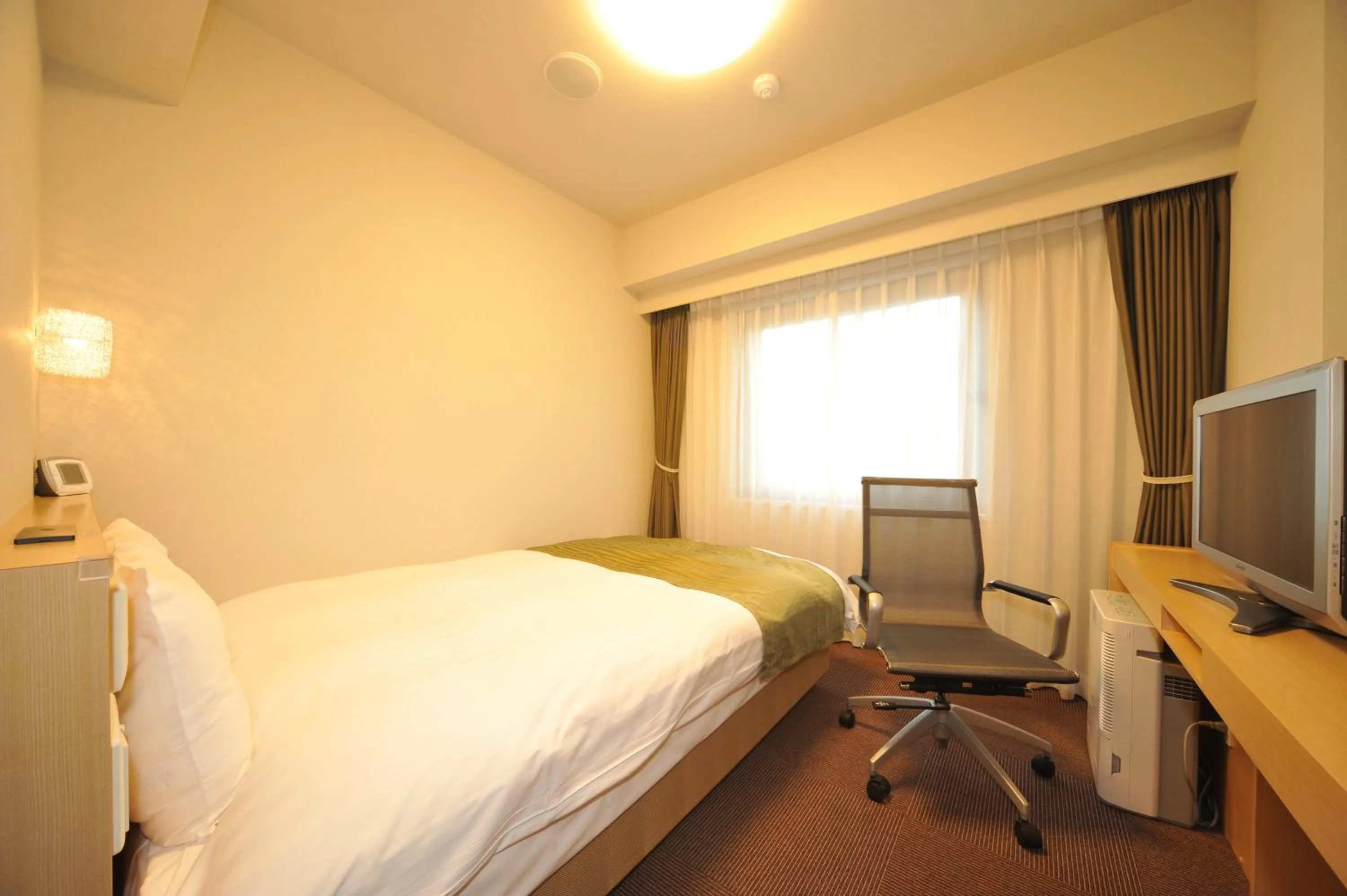Living room, Bed in Dormy Inn Obihiro