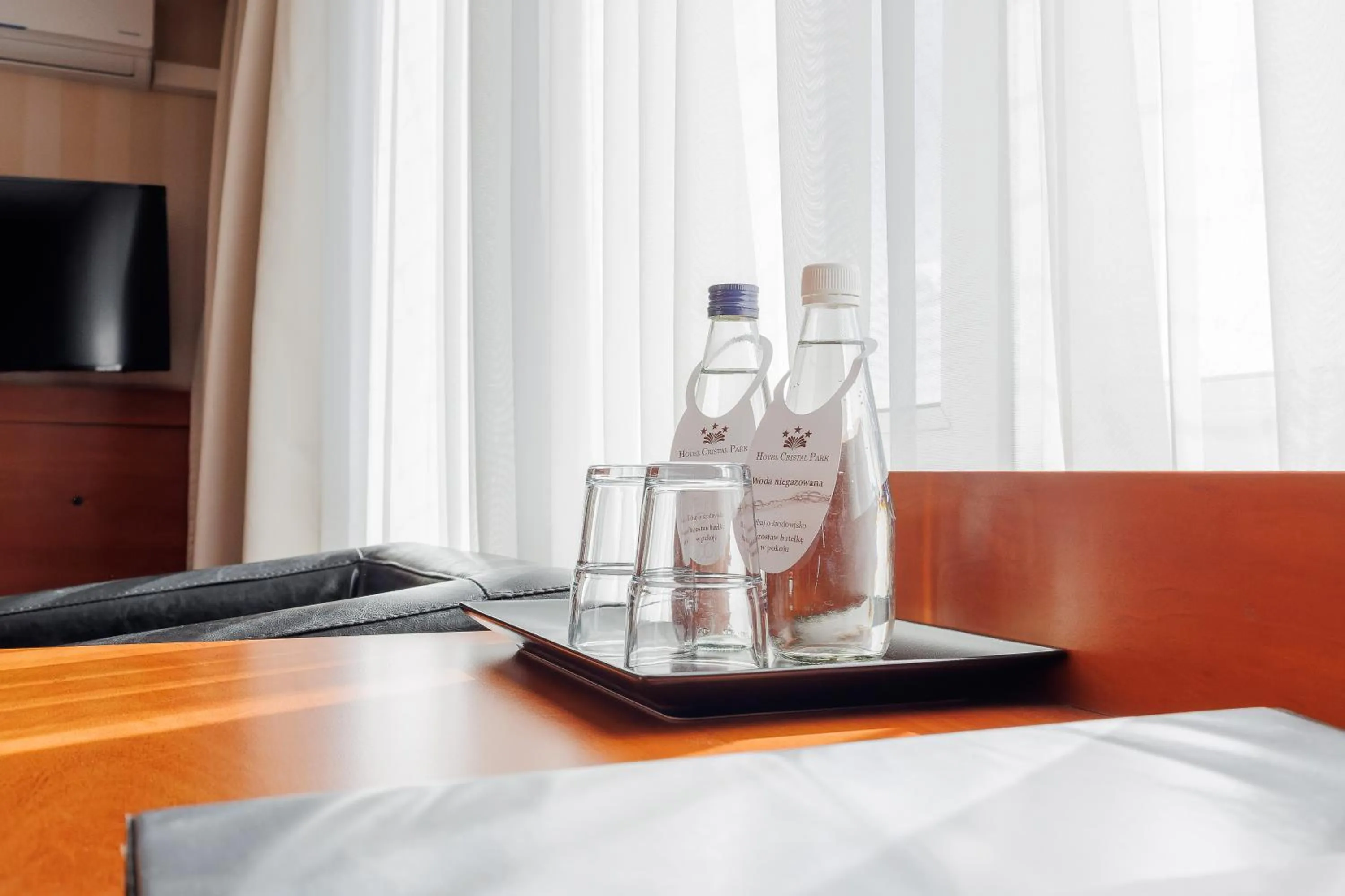 Seating area, Bed in Hotel Cristal Park