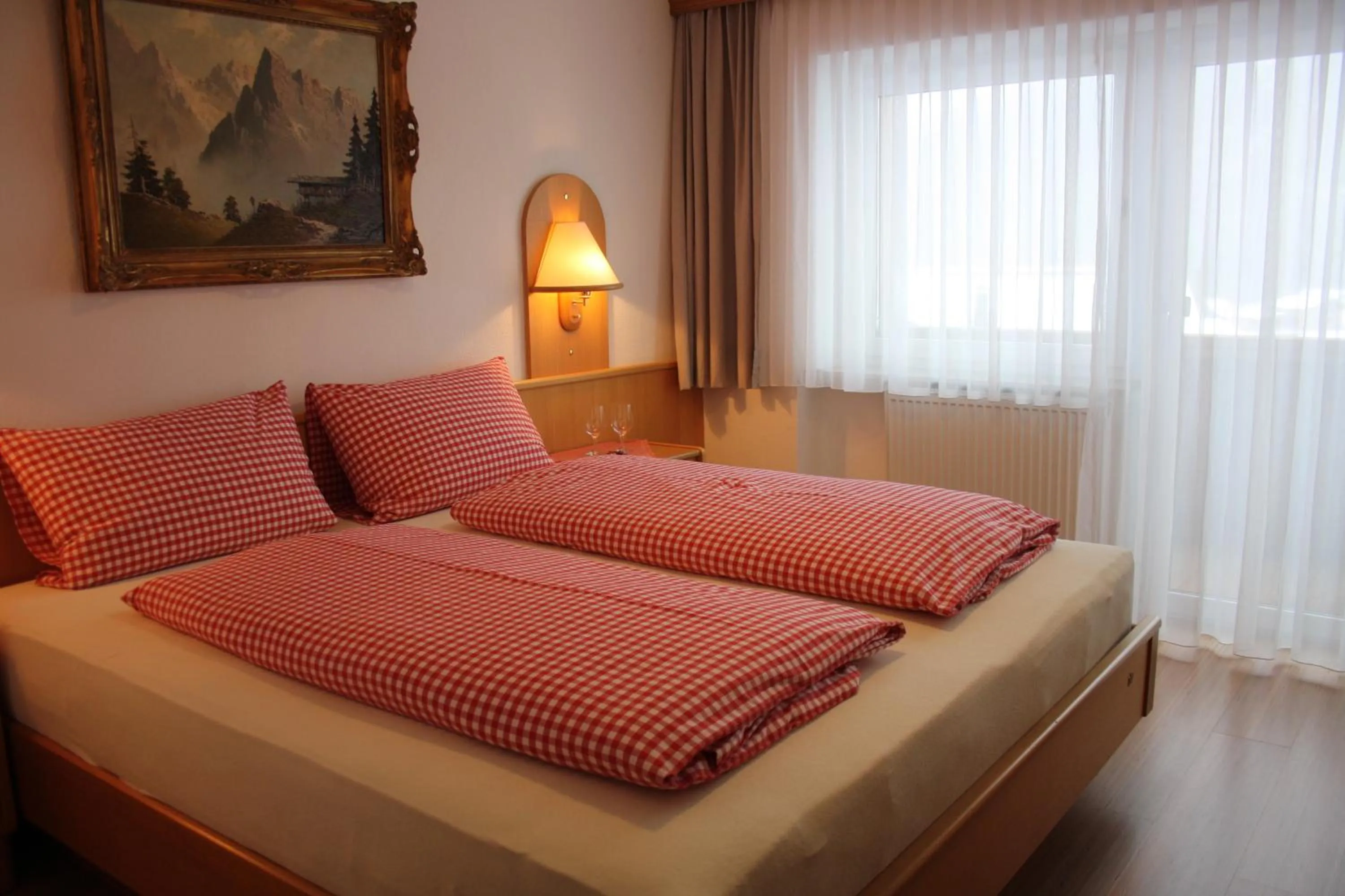 Photo of the whole room, Bed in Landhotel Wolf