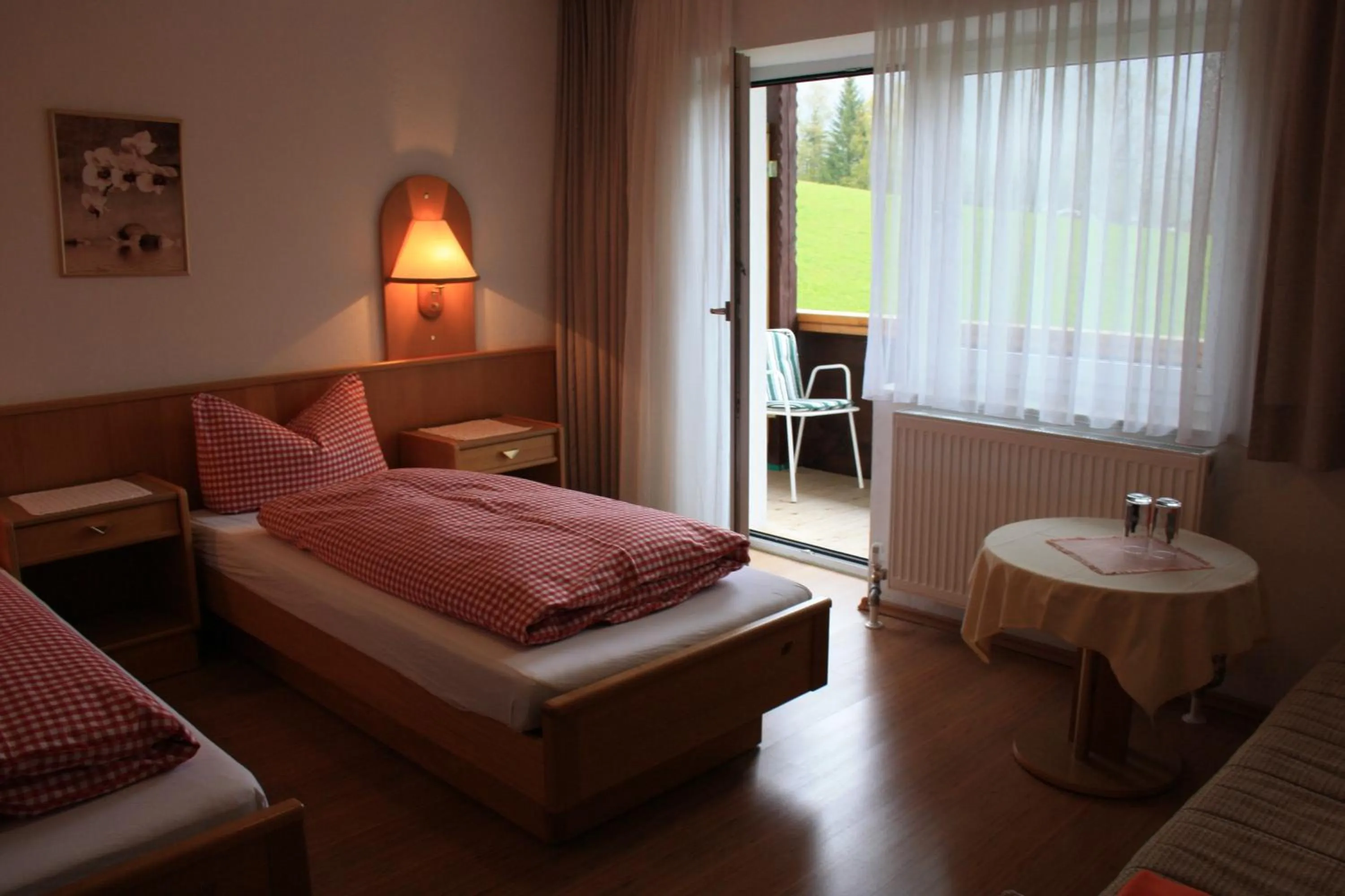 Photo of the whole room, Bed in Landhotel Wolf
