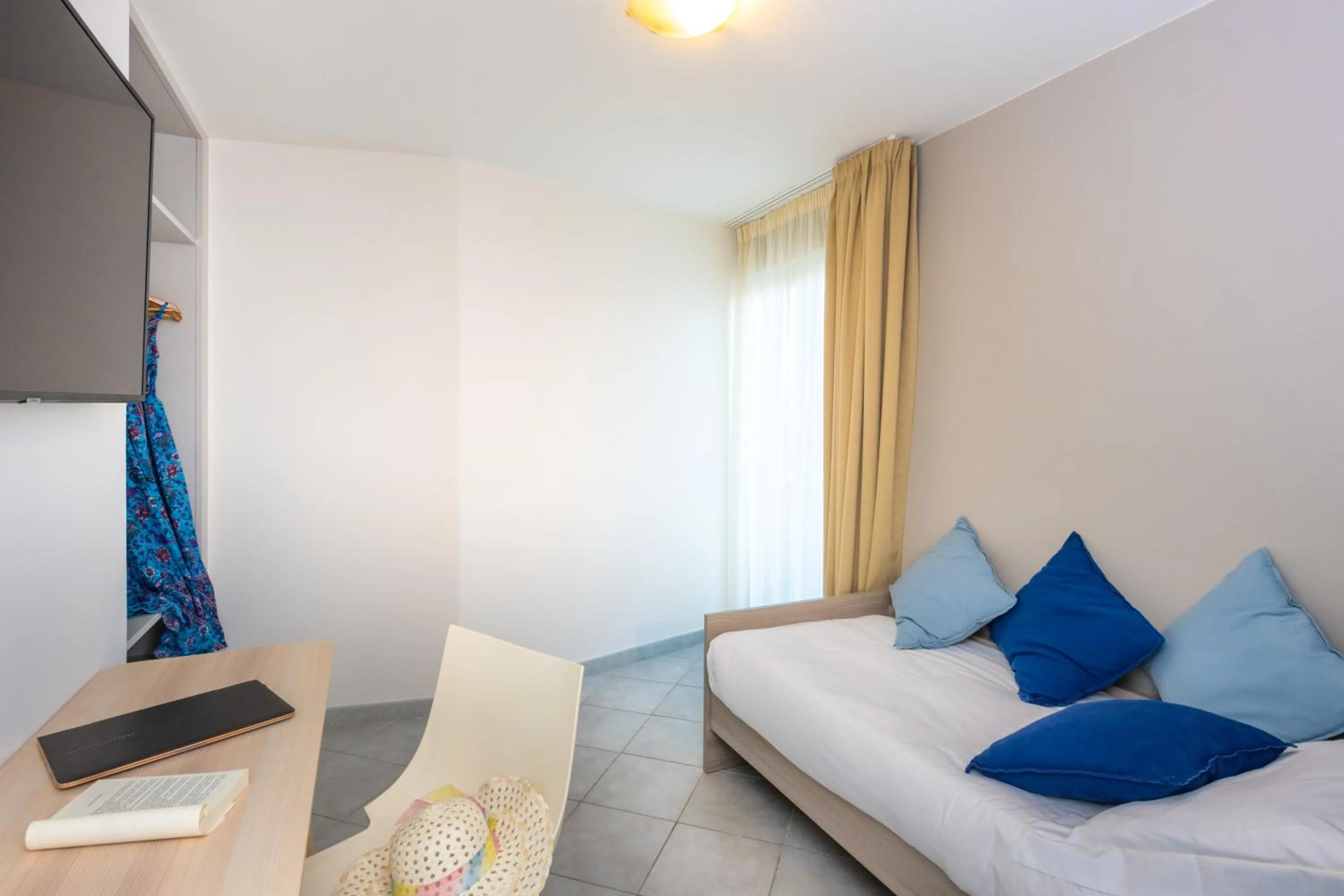 Bed in Amarina Hotel