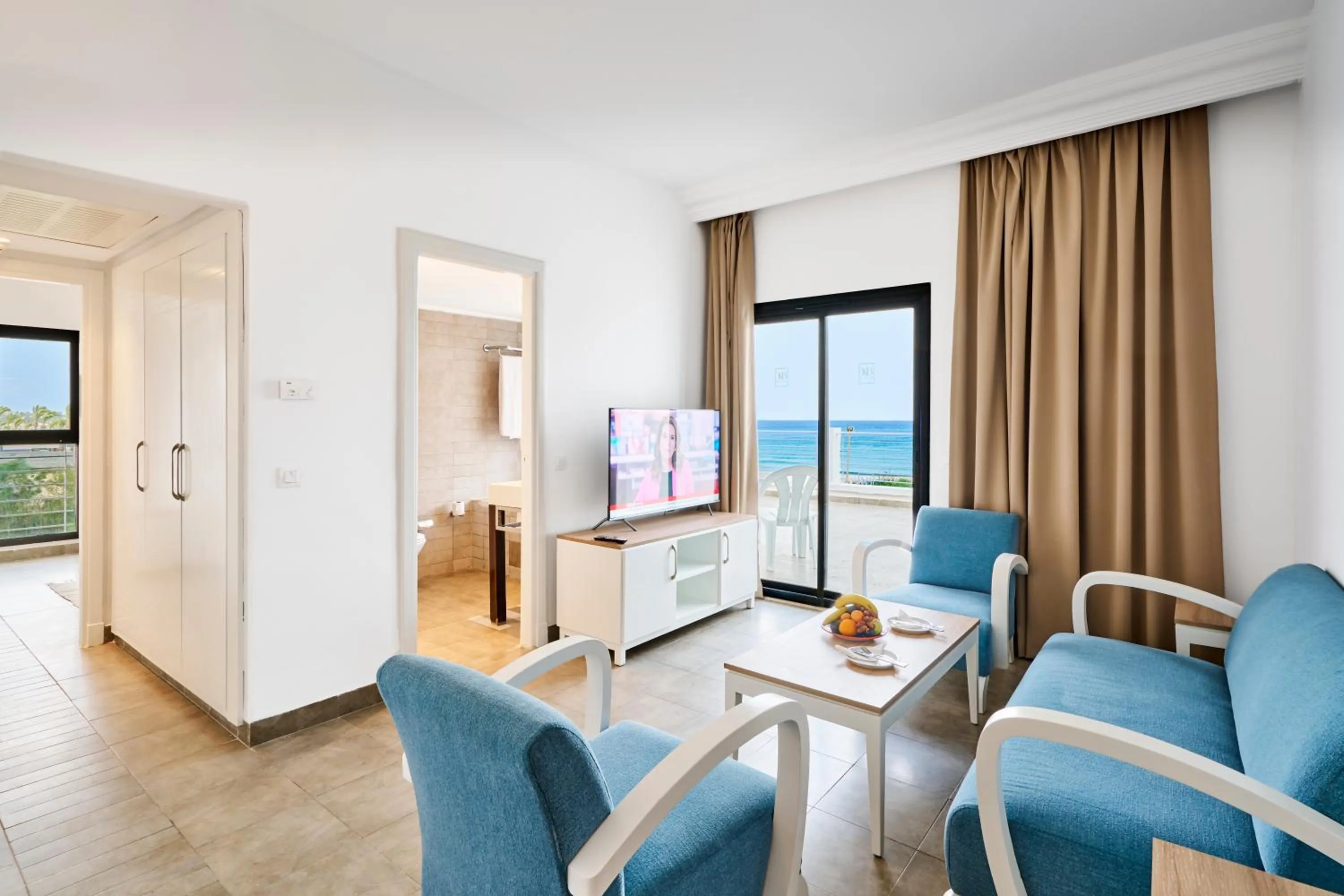 Communal lounge/ TV room in Nozha Beach Resort & Spa