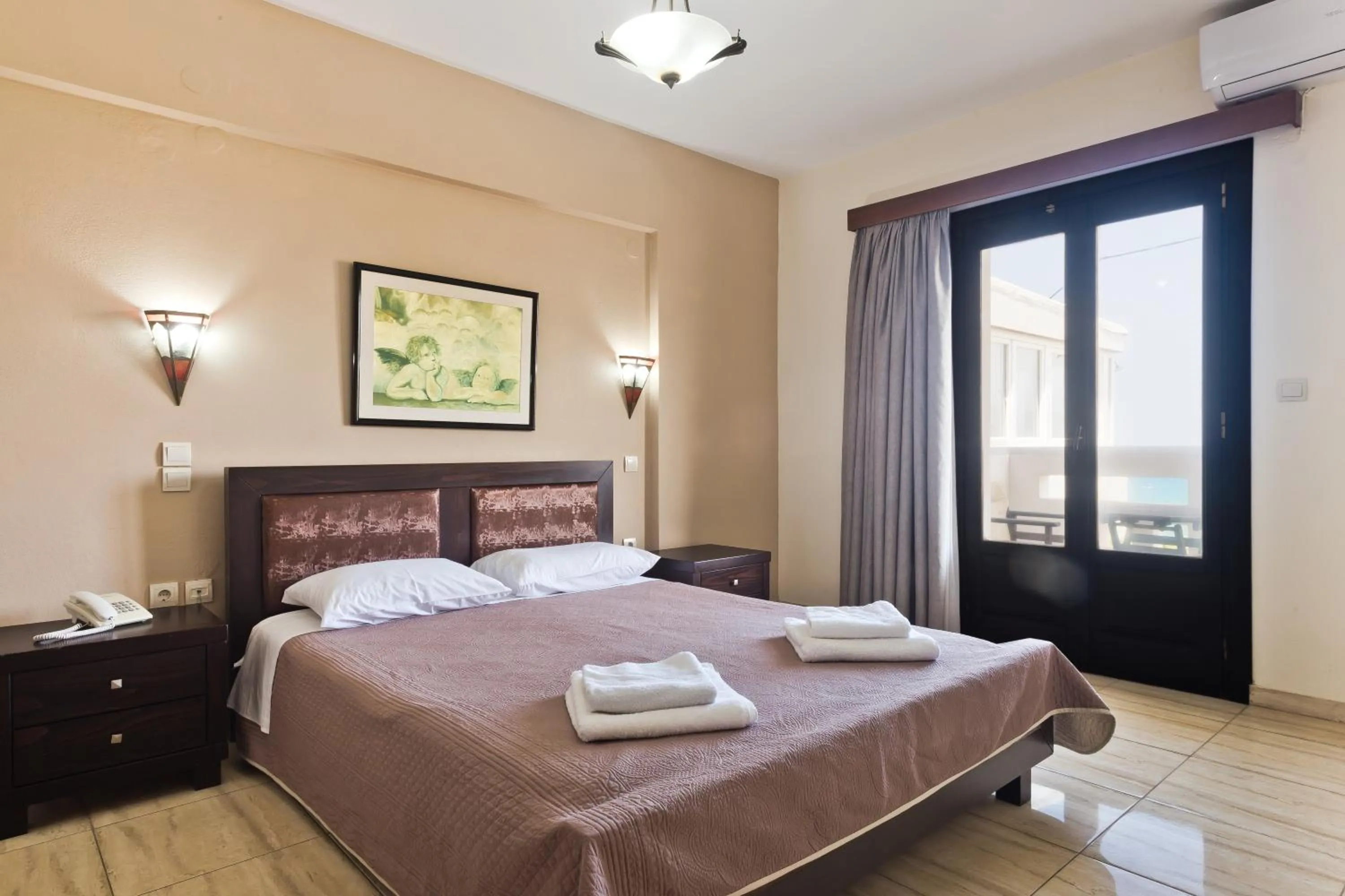 Bedroom, Bed in Arkasa Bay Hotel