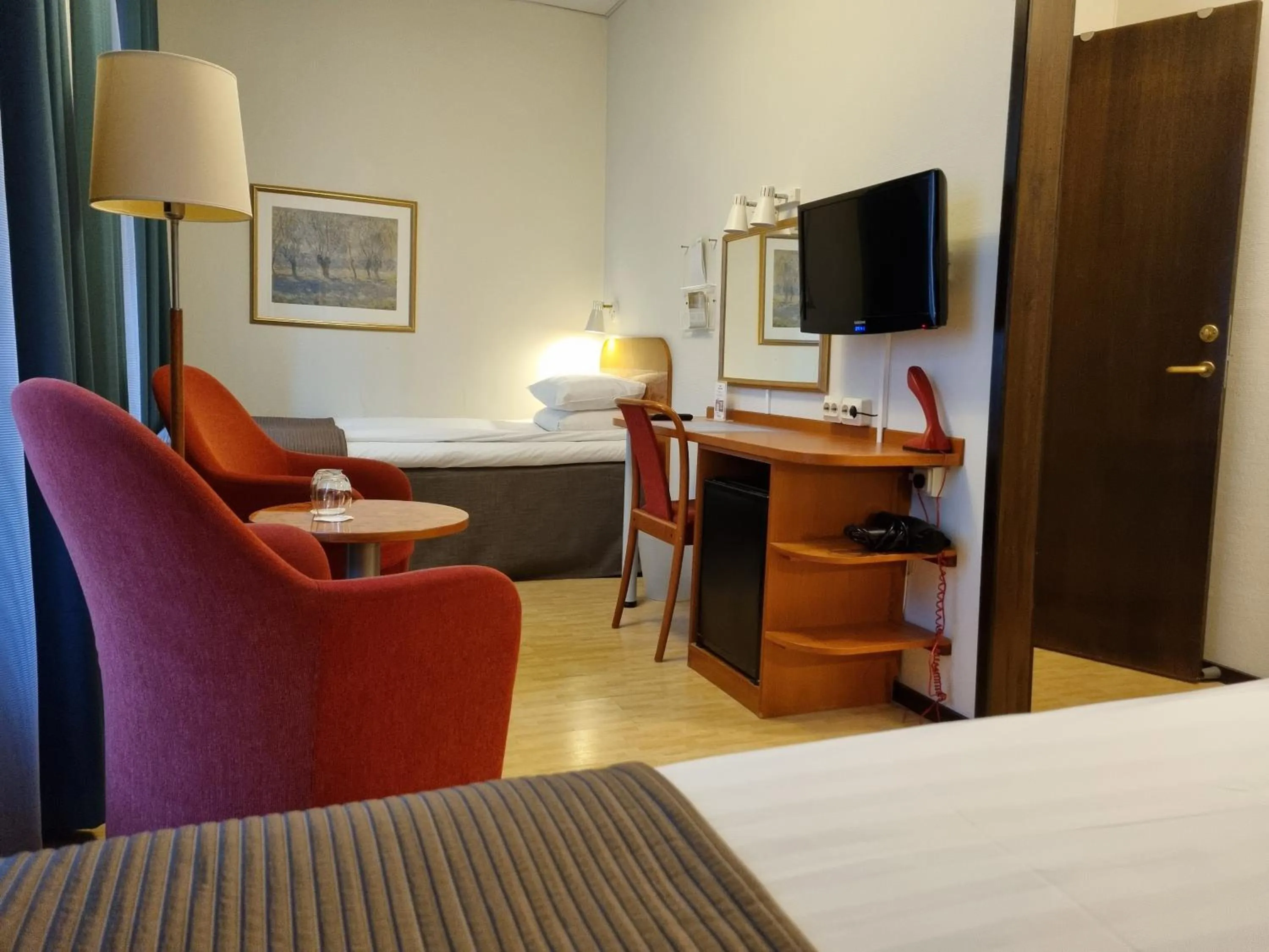 Seating area, Bed in Hotel Lorensberg