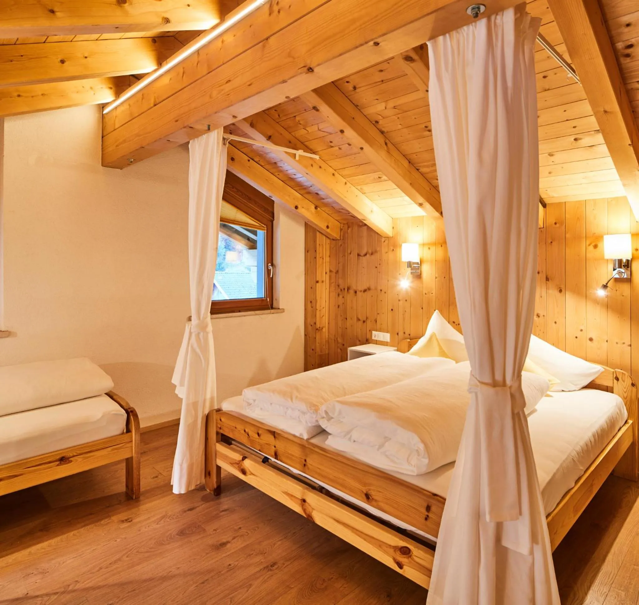 Bedroom, Bed in Tirolerhof - Appartementhaus