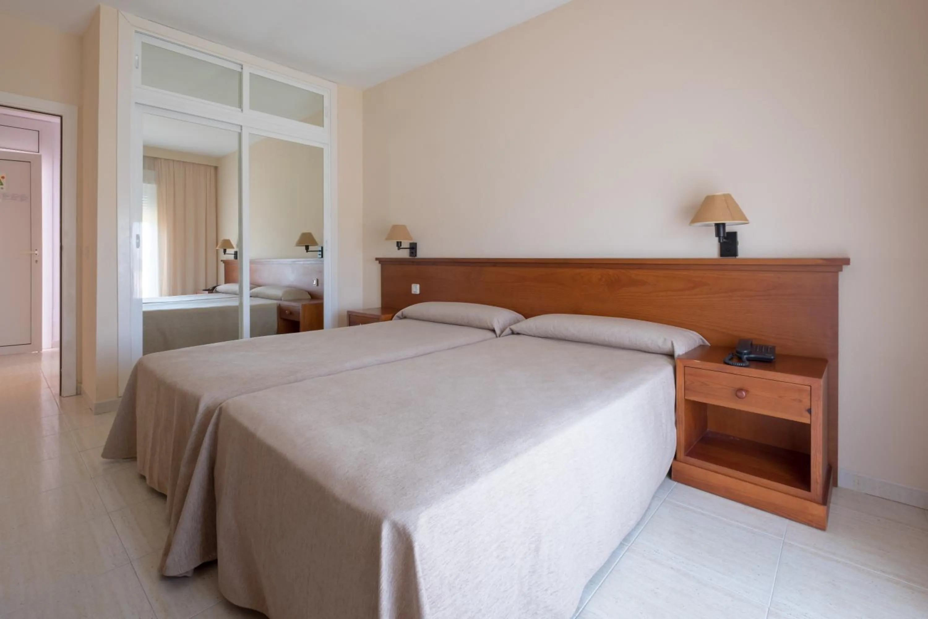 Bed in Aparthotel las Dunas