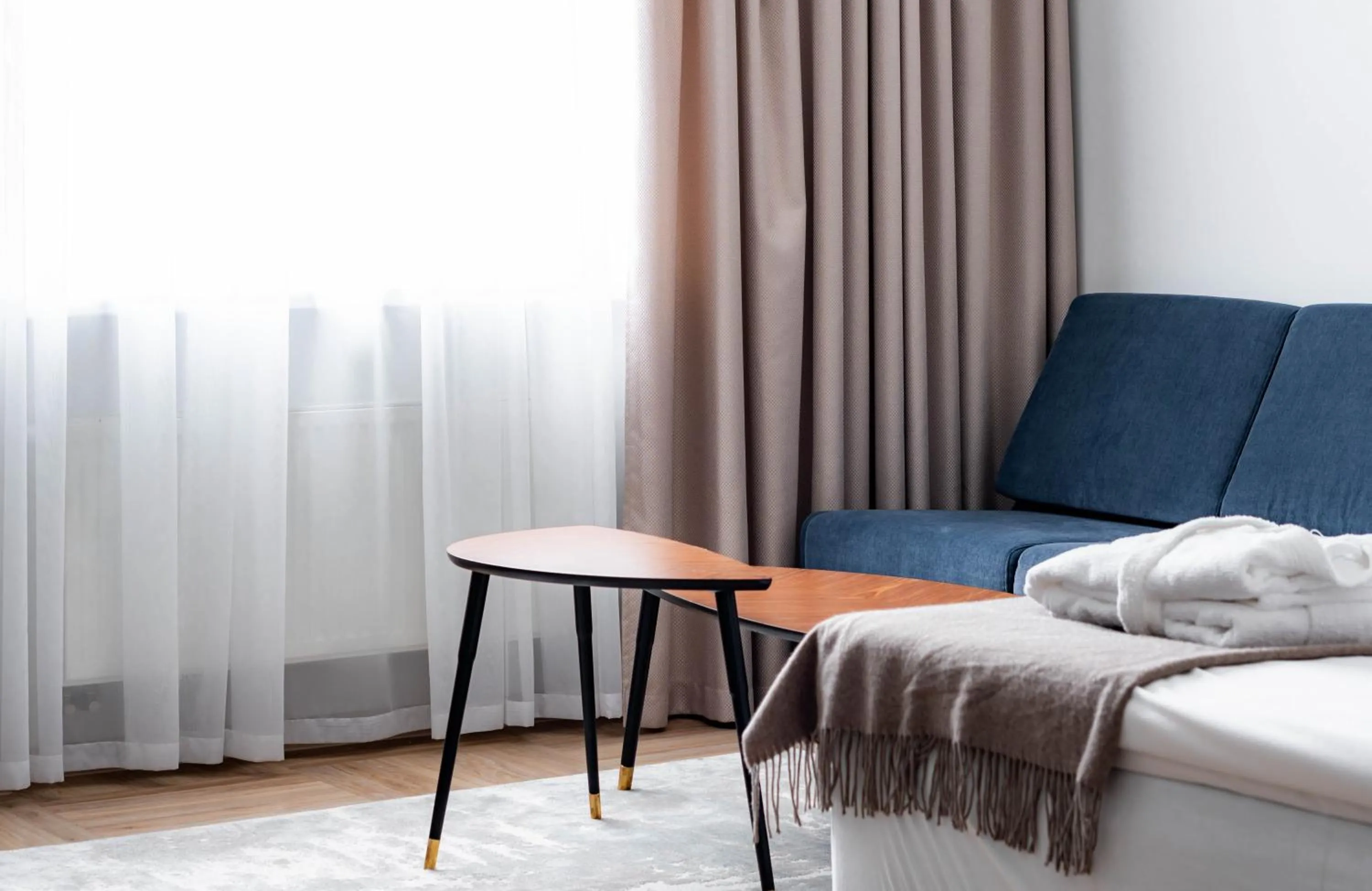 Living room, Bed in Narva Hotell & Spaa