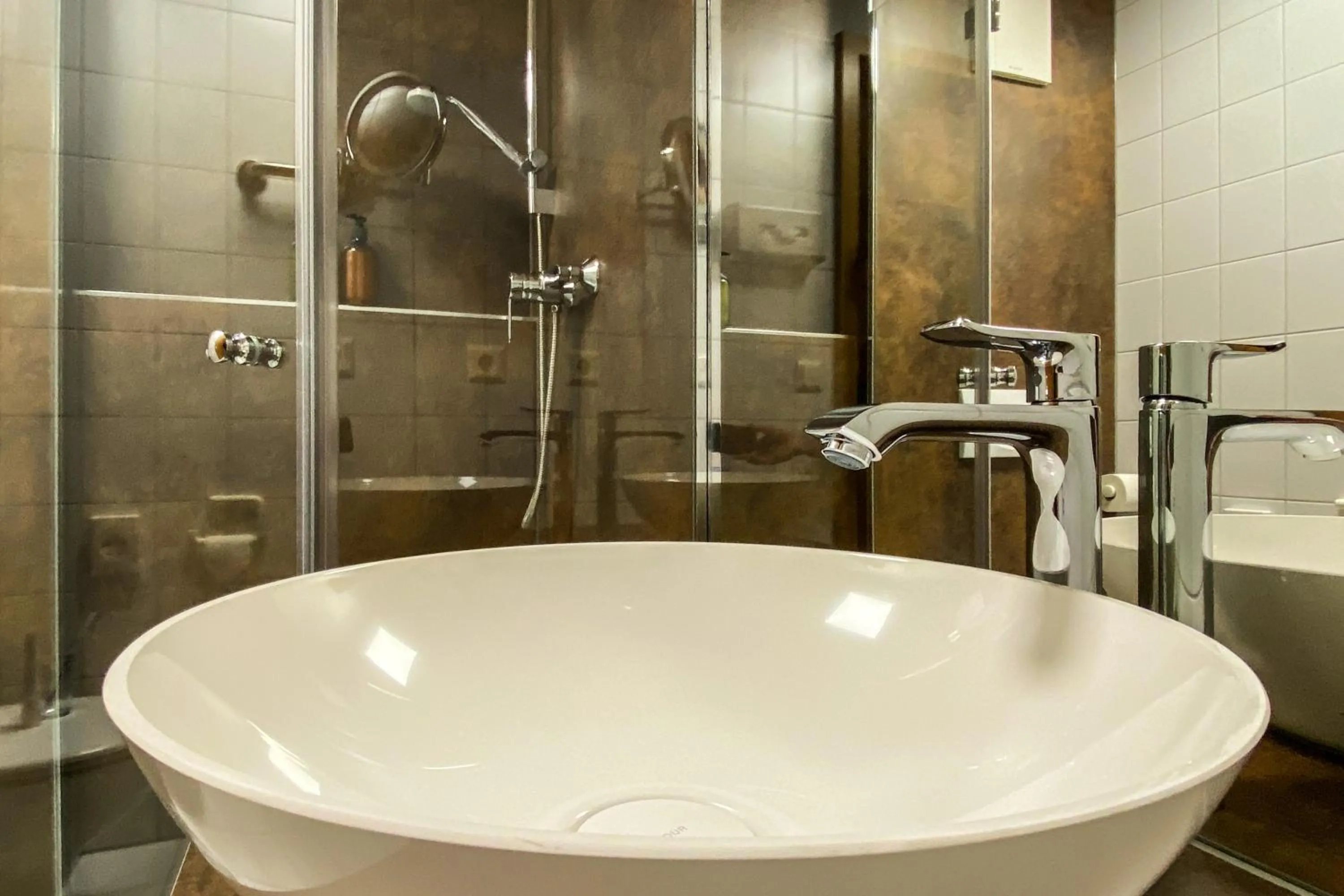 Bathroom in IMPULSIV Hotel & Sportresort