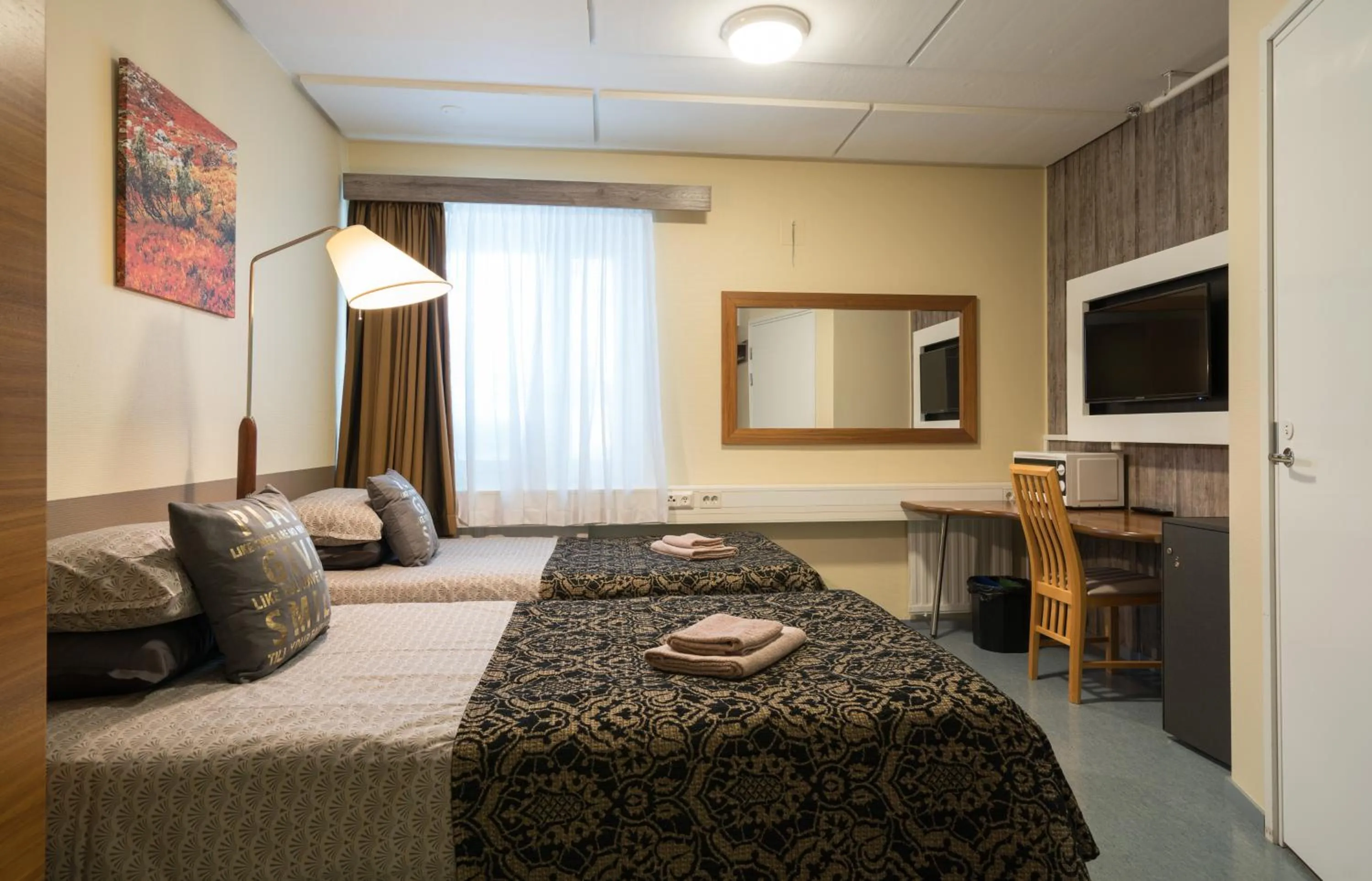 Photo of the whole room, Bed in Gasthaus Patruuna