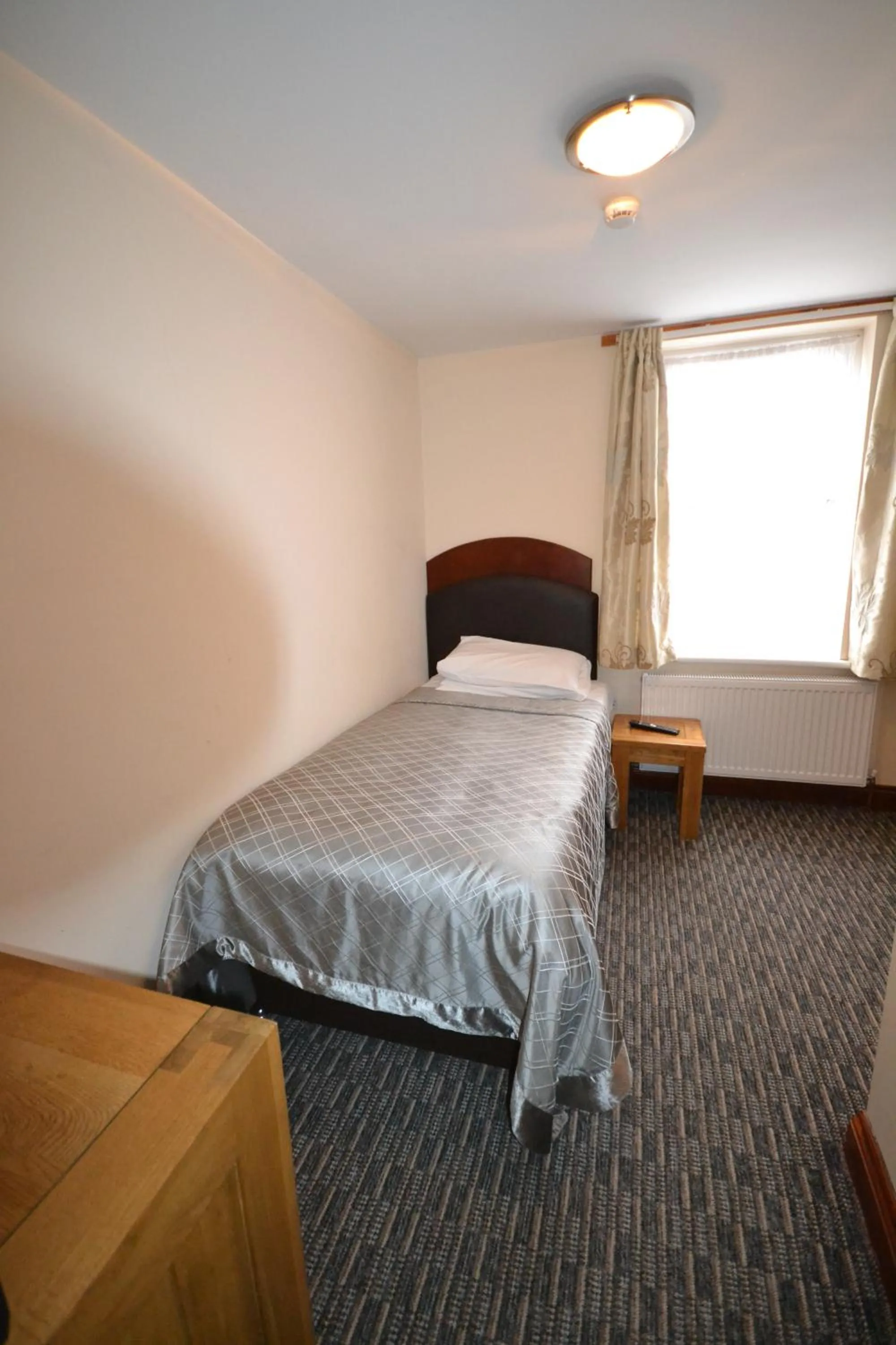 Bed in Airport Guest House