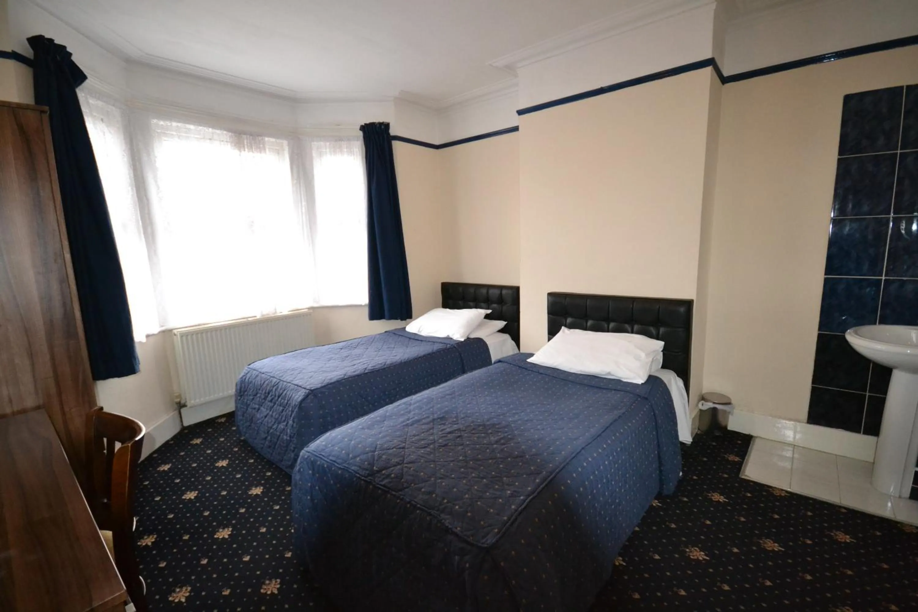 Bed in Airport Guest House