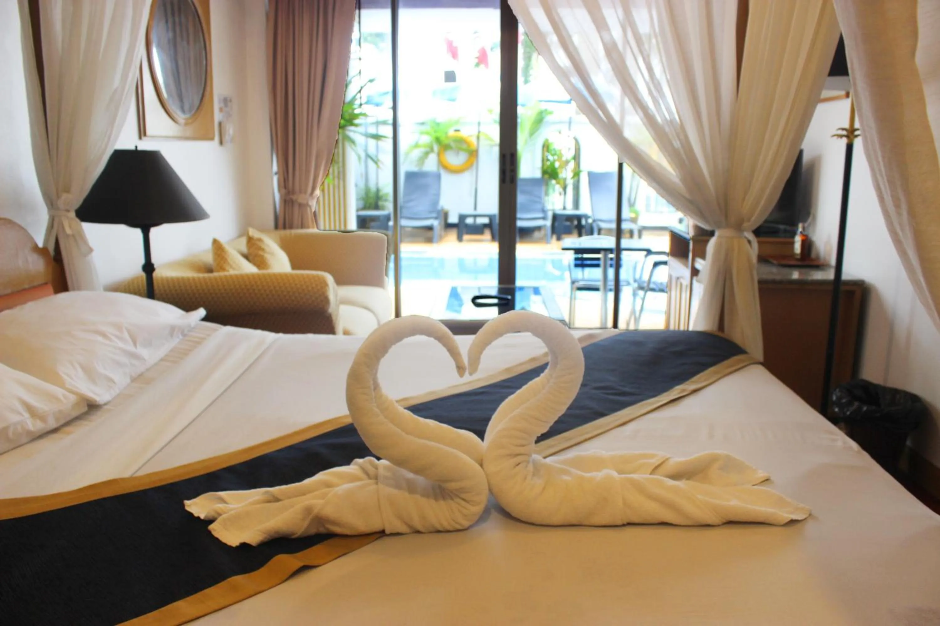 Photo of the whole room, Bed in Orchid Hotel and Spa Kalim Bay
