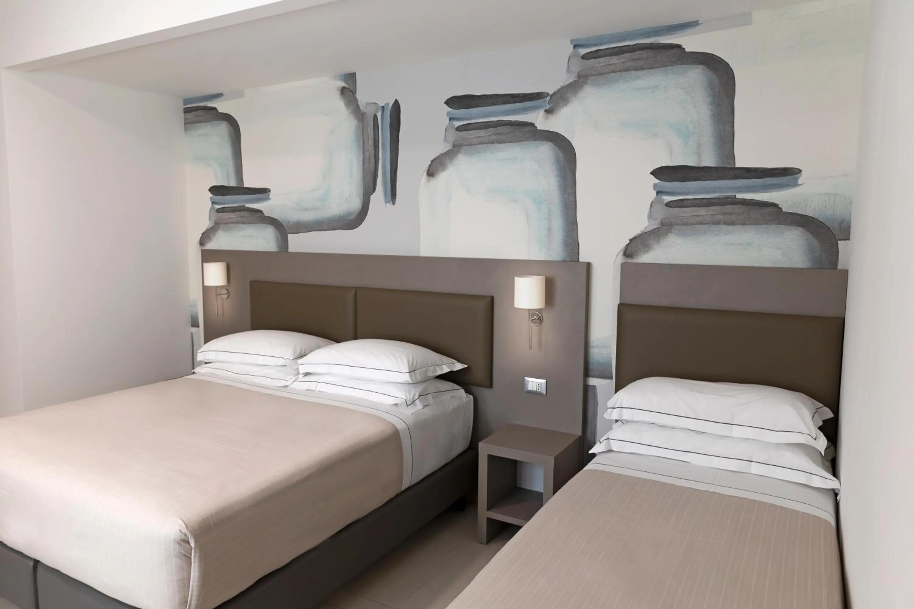 Bed in Hotel Miramare