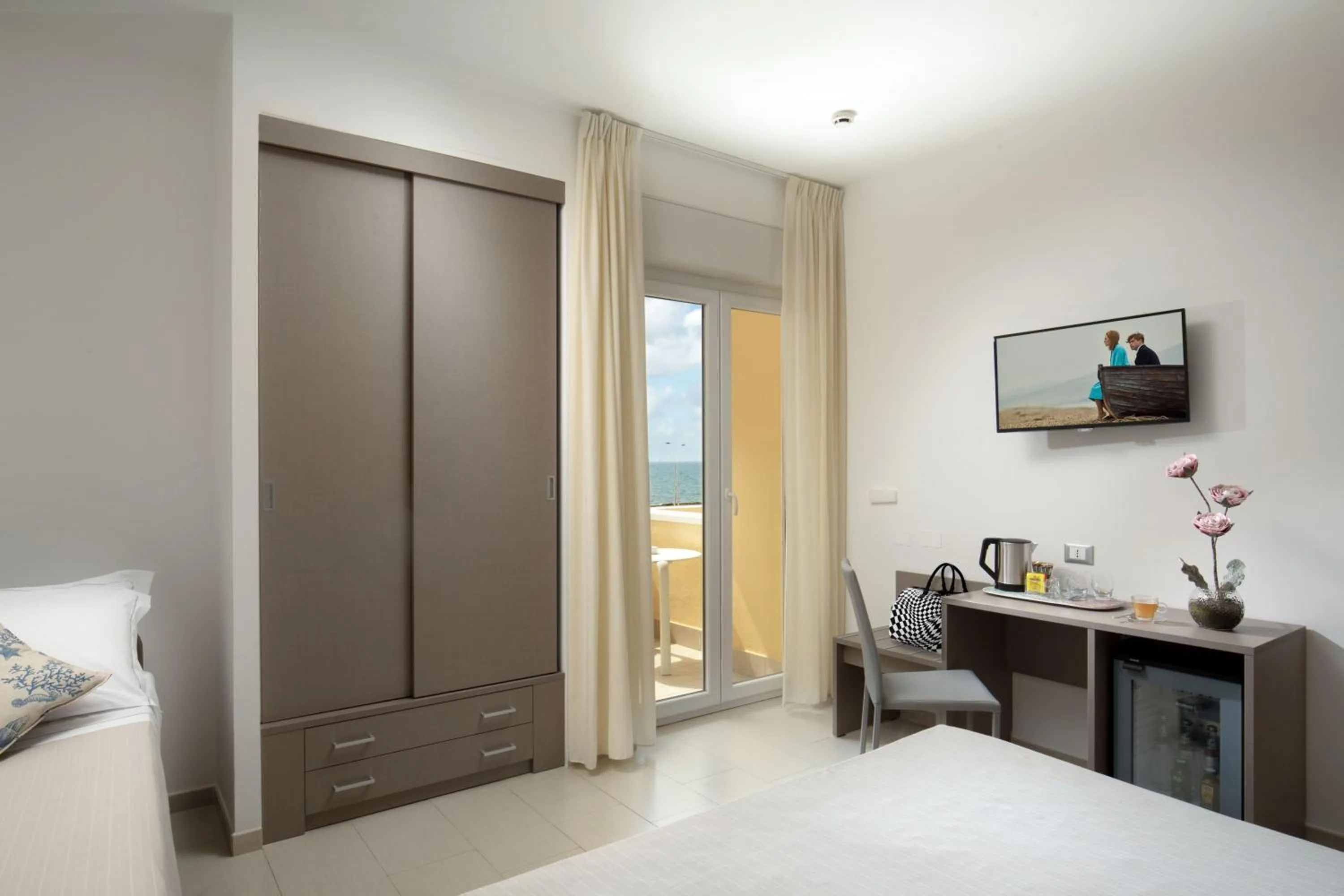 Bed in Hotel Miramare