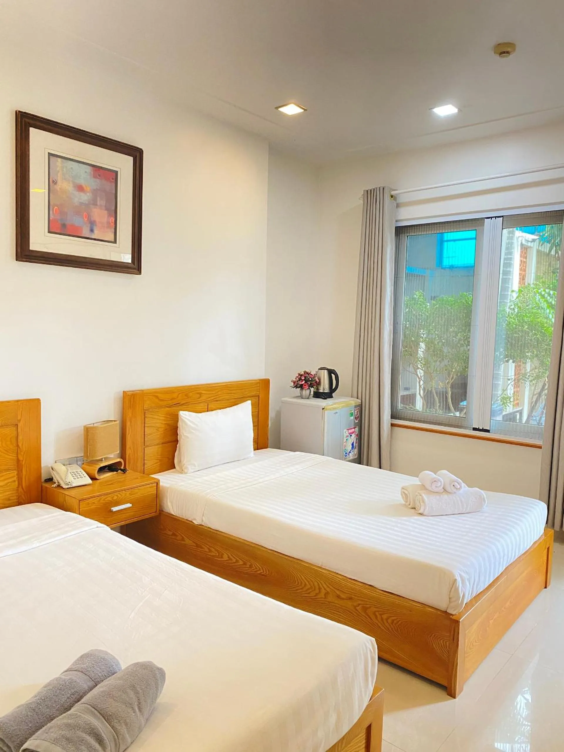 Bed in Qli Hotel Muine