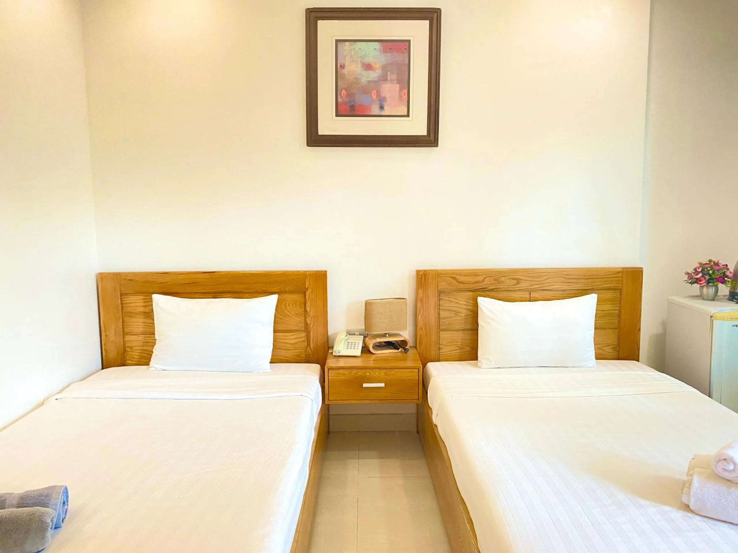 Bed in Qli Hotel Muine