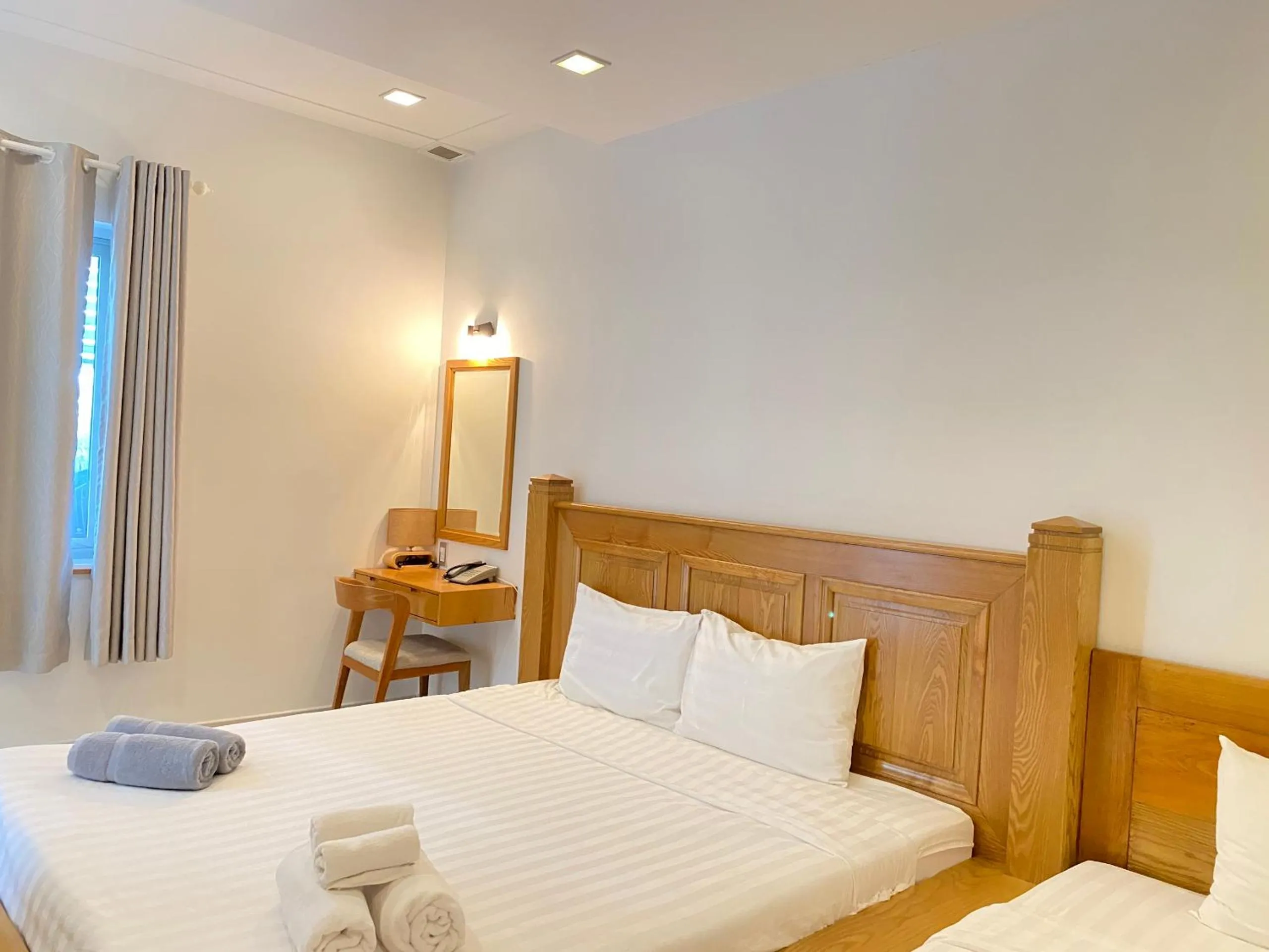 Bed in Qli Hotel Muine