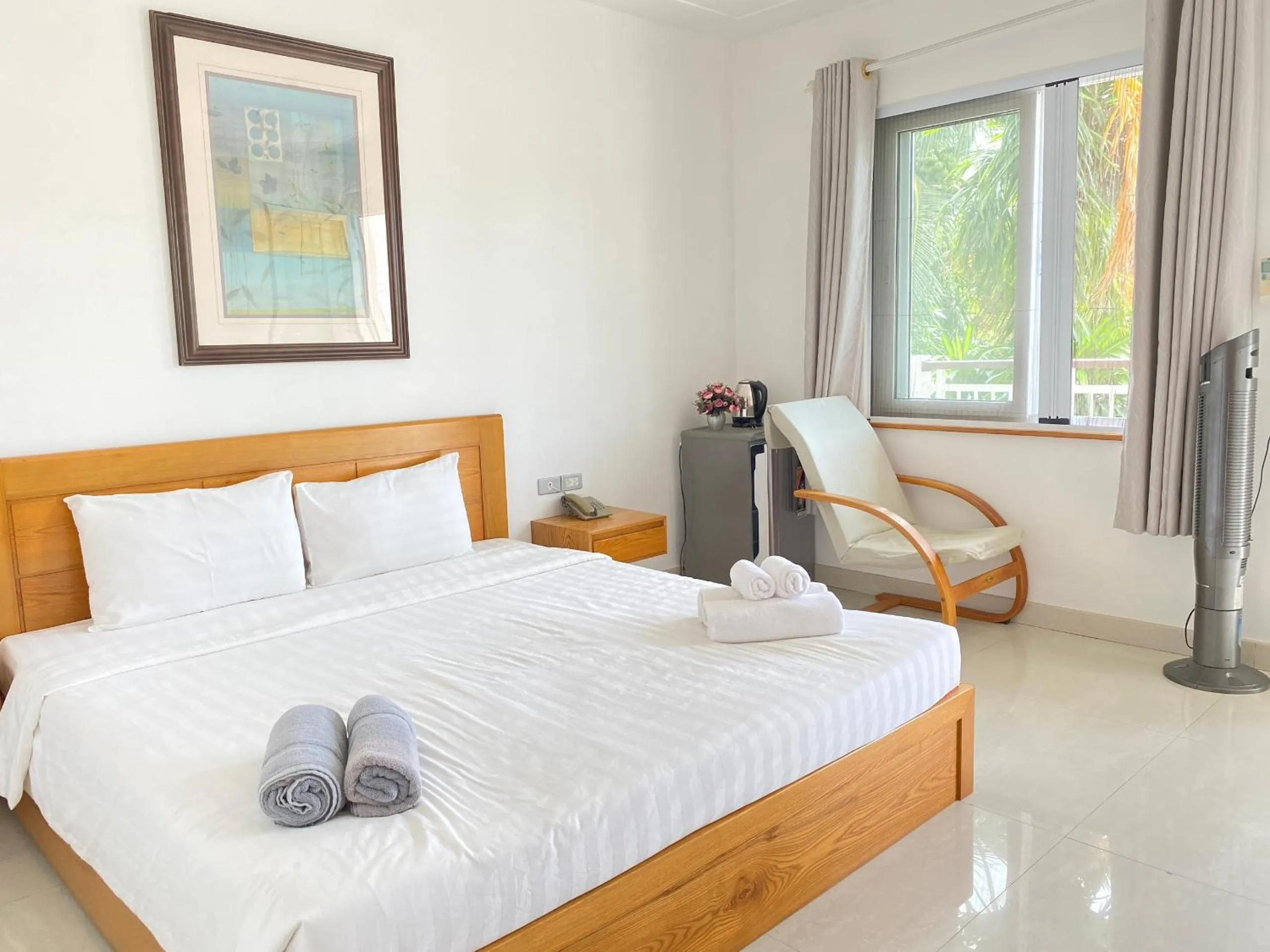 Bed in Qli Hotel Muine