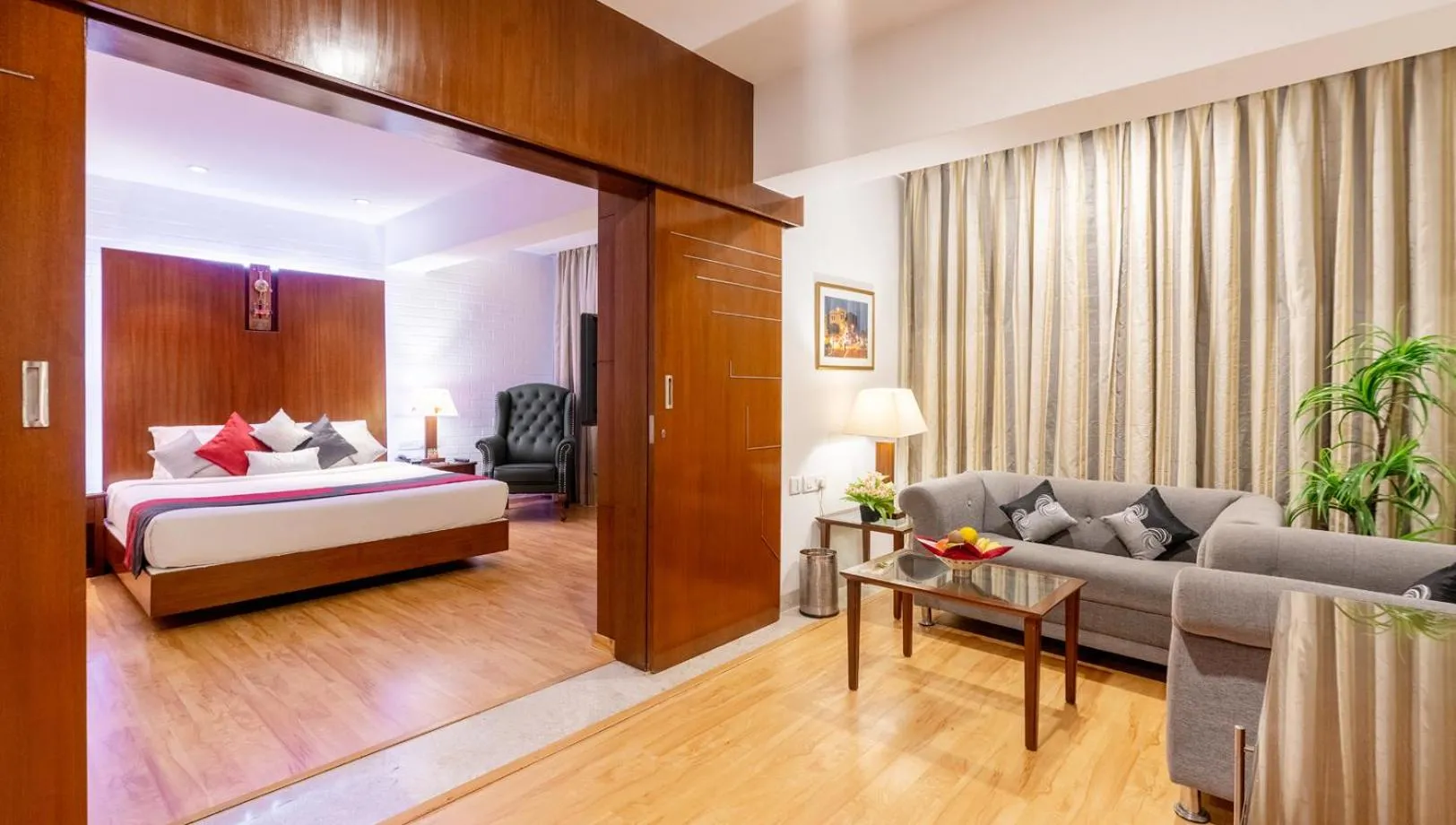 Living room, Bed in SFO Hotel and Suites