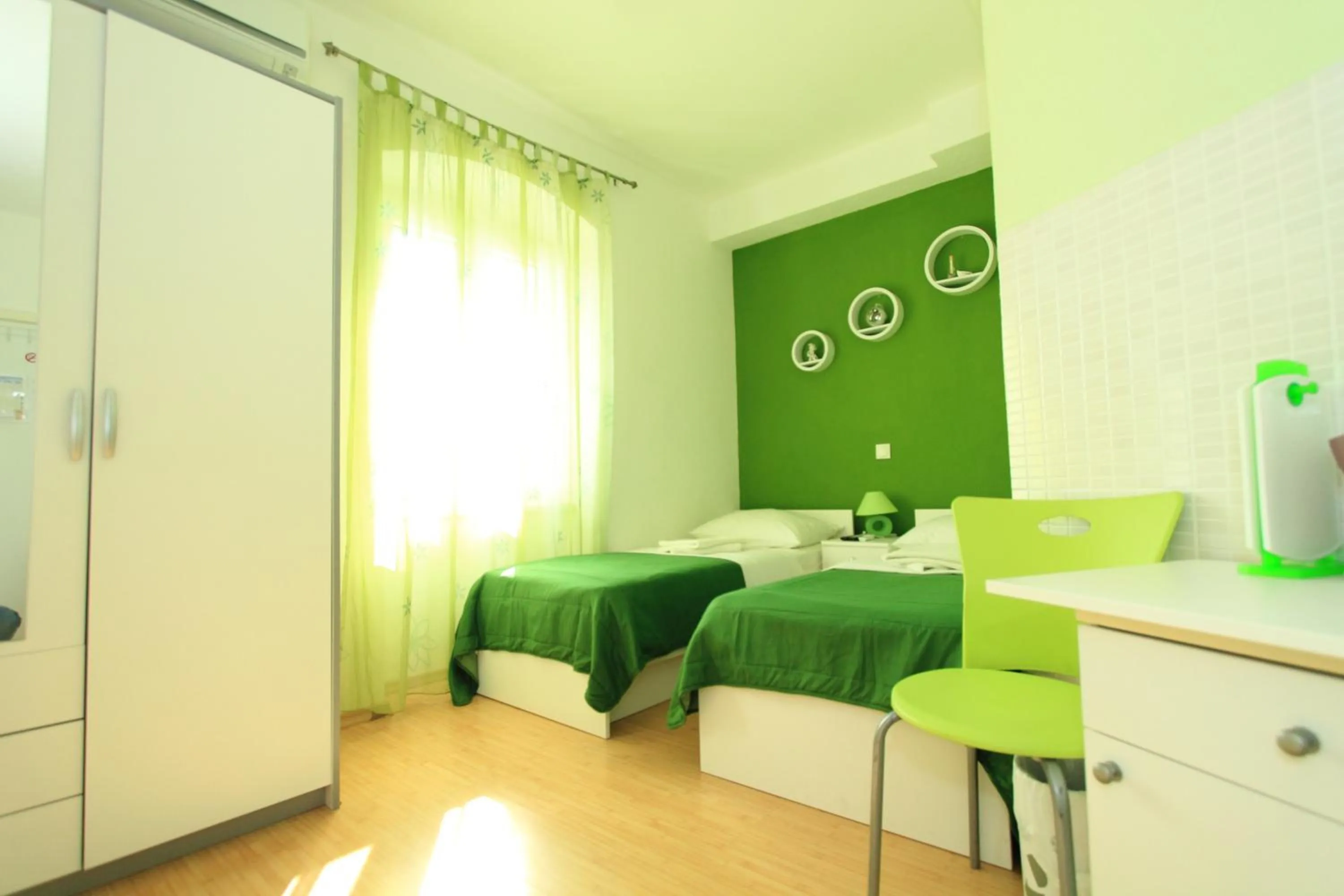 Bedroom, Bed in Nirvana Rooms & Apartments