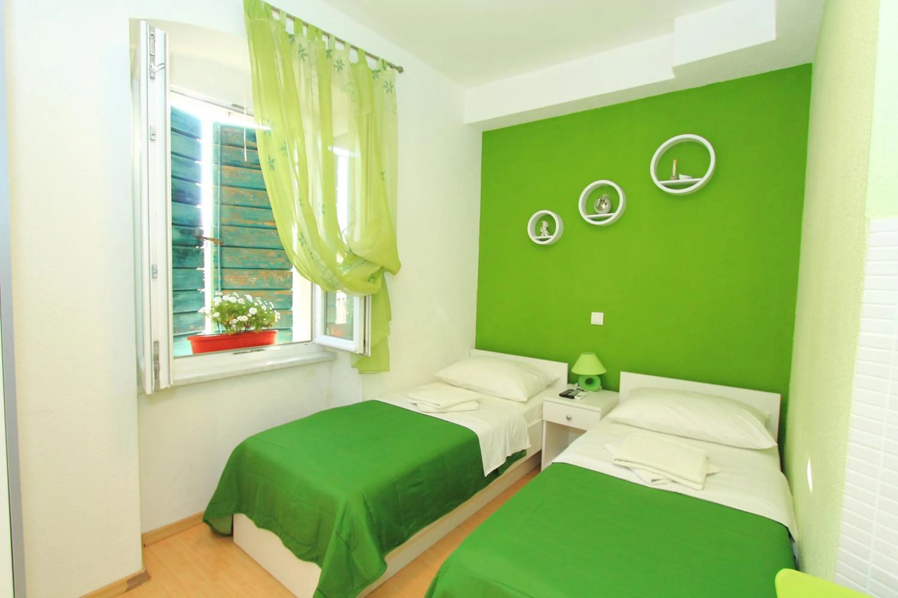 Bedroom, Bed in Nirvana Rooms & Apartments