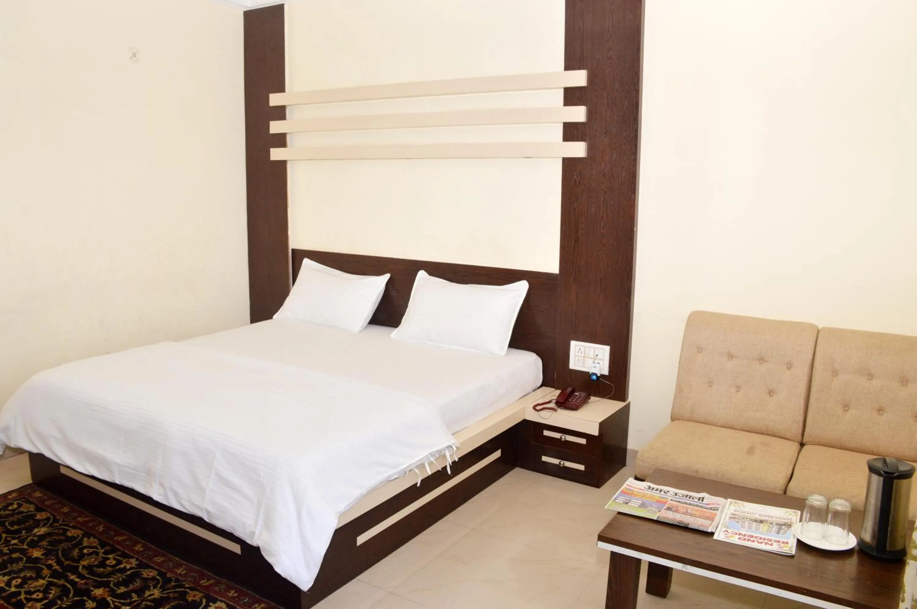 Bed in Hotel Nand Residency