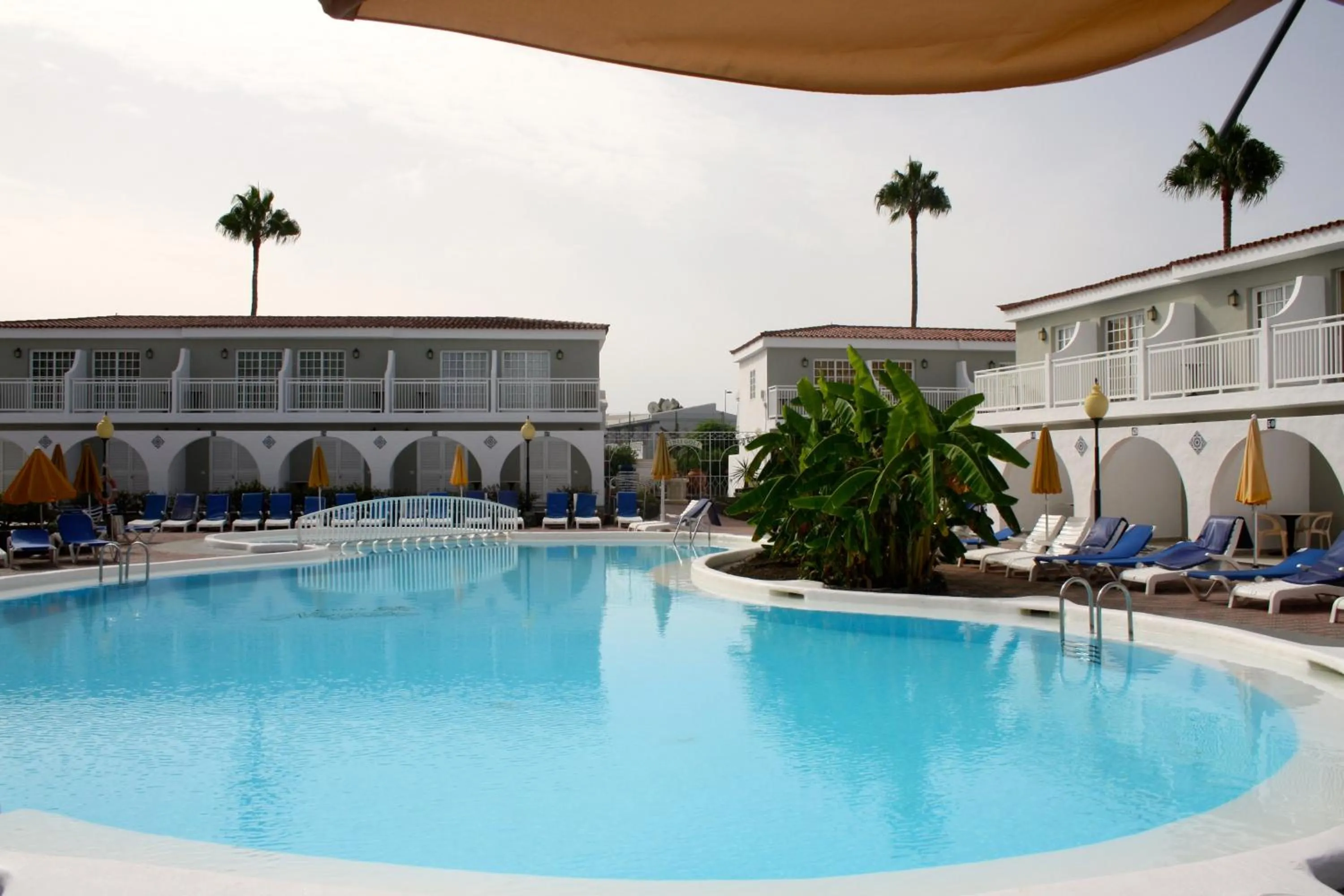 Pool view in Bungalows Parque Nogal