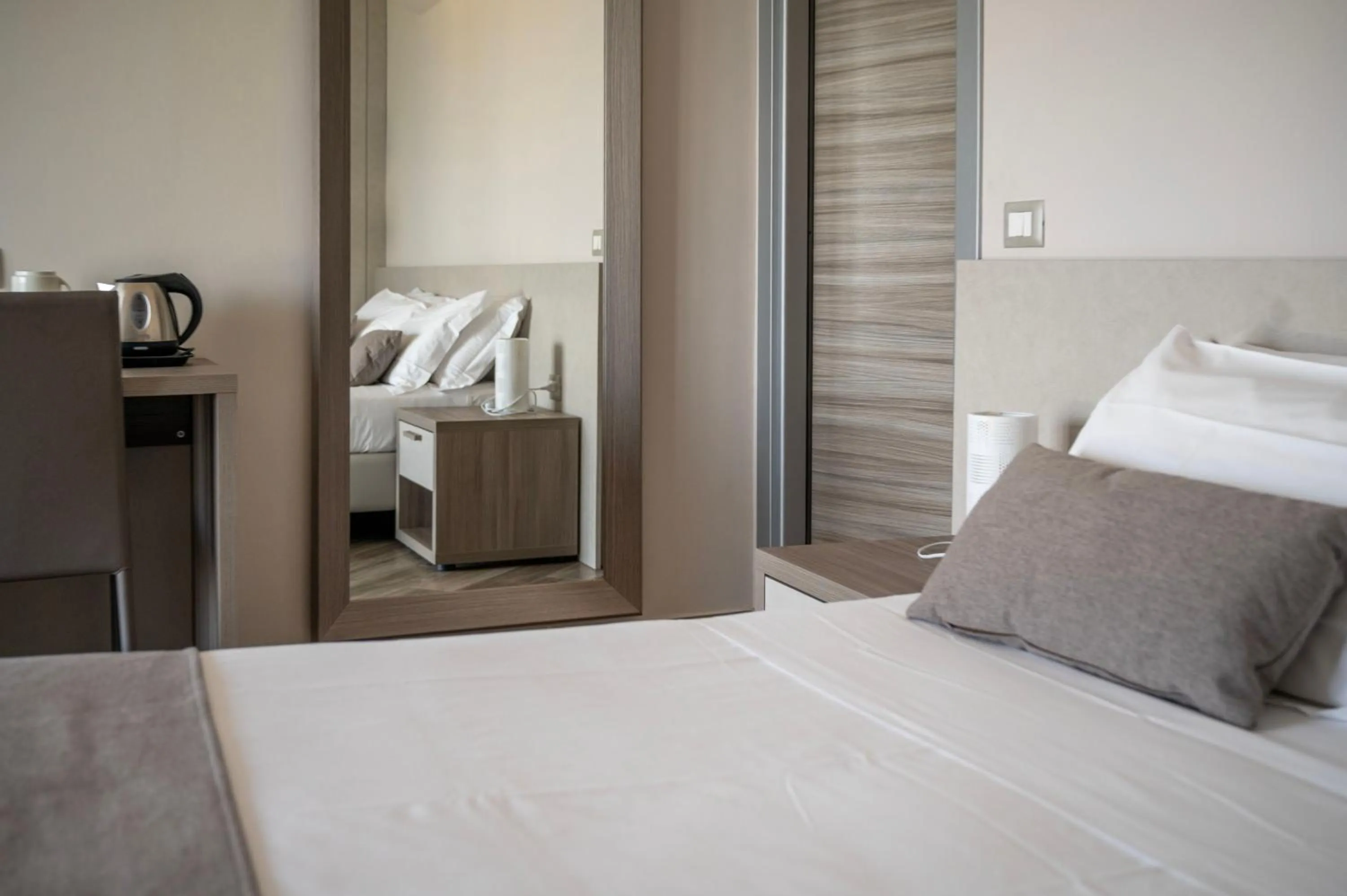 Bed in Hotel Mediterraneo