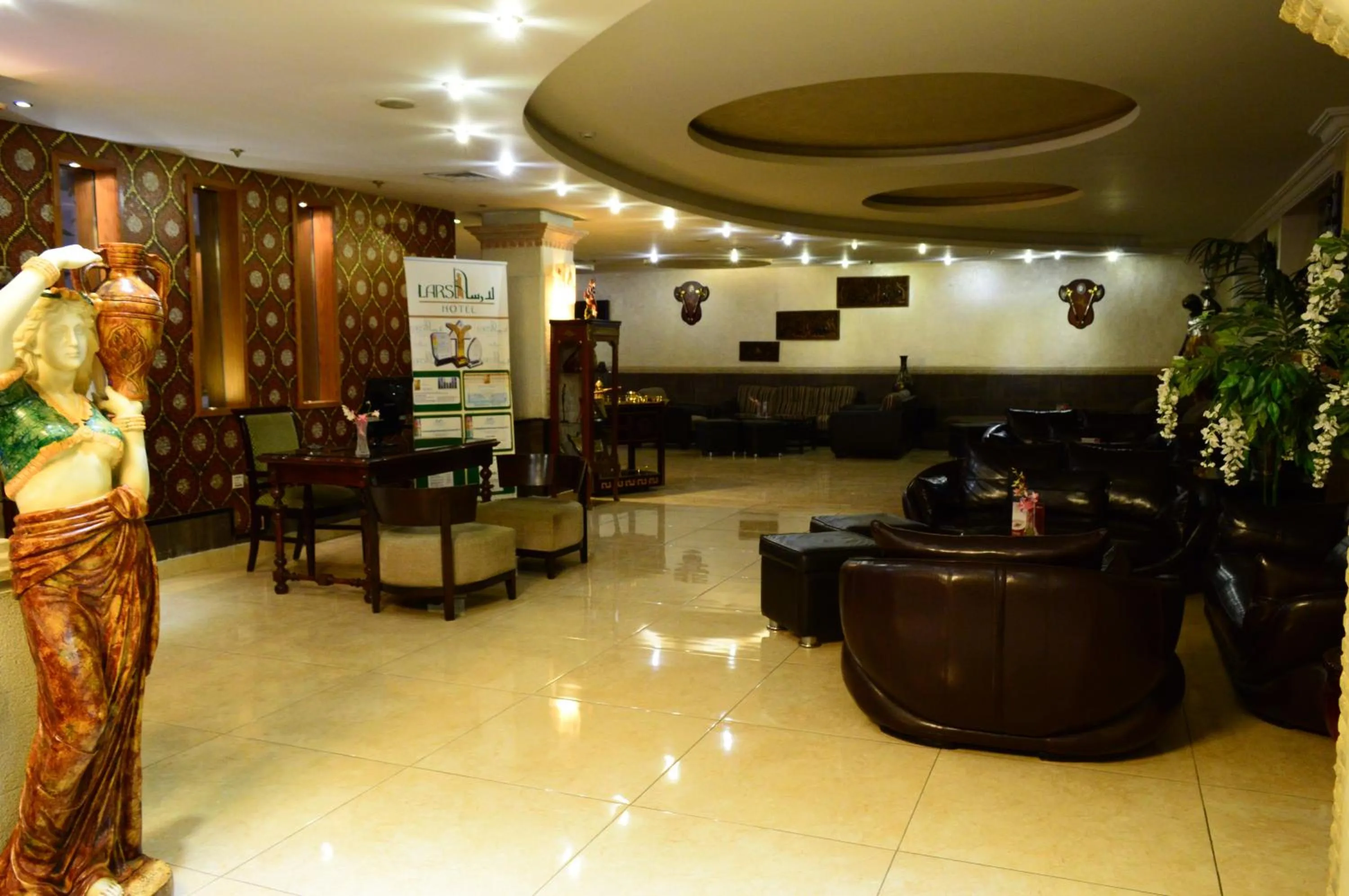 Lobby or reception in Larsa Hotel