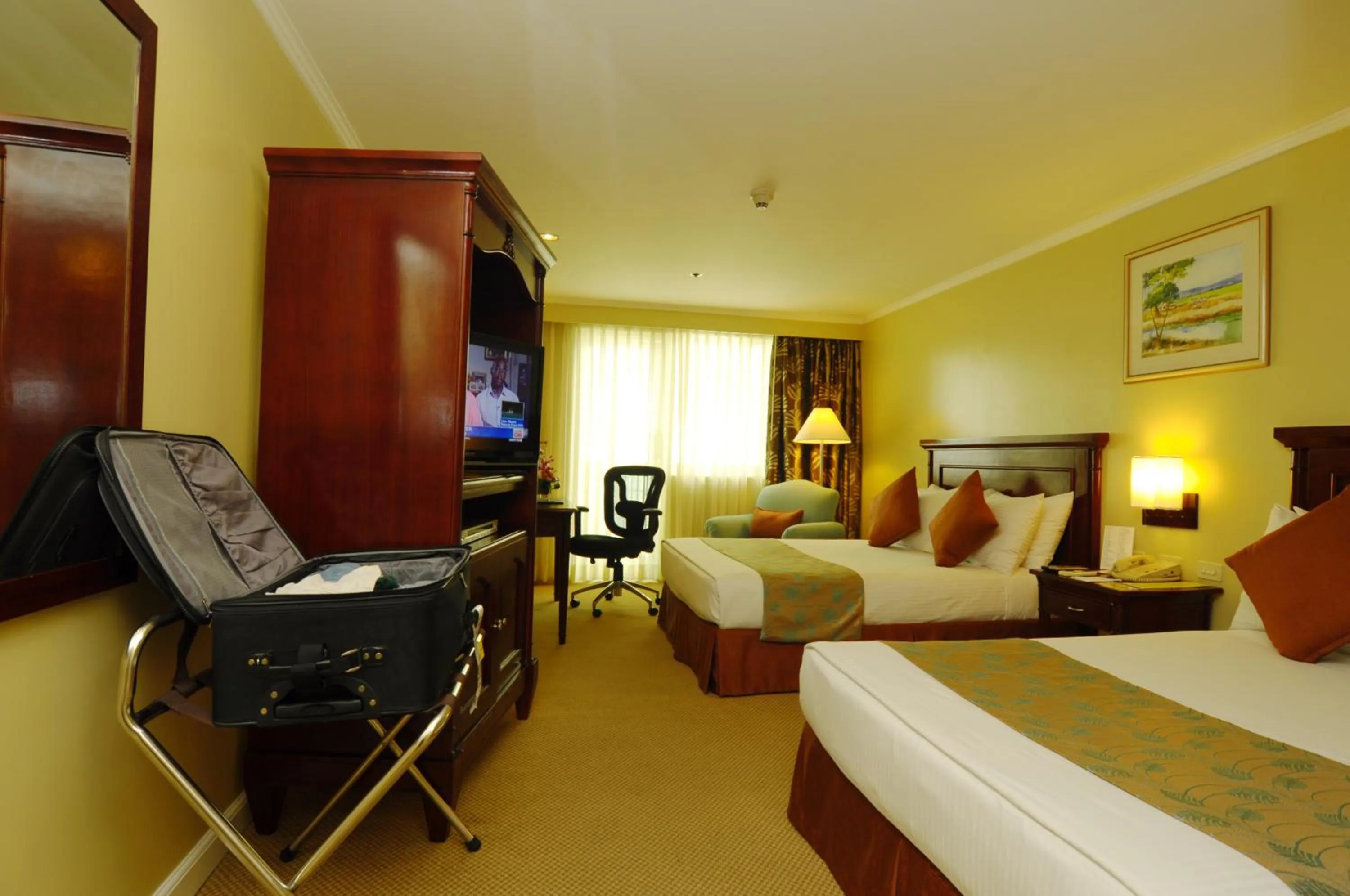 Bed in Oxford Suites Makati