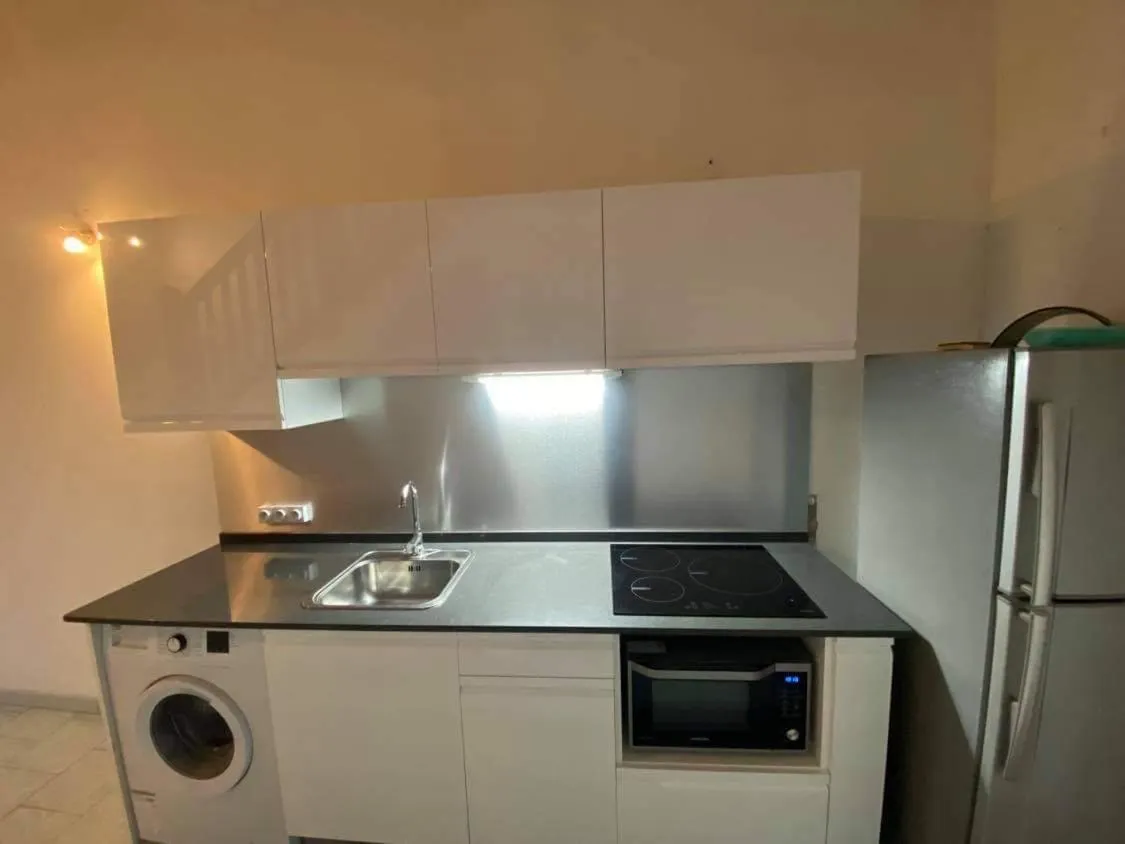 Kitchen or kitchenette in AIGUE MARINE Divaloc