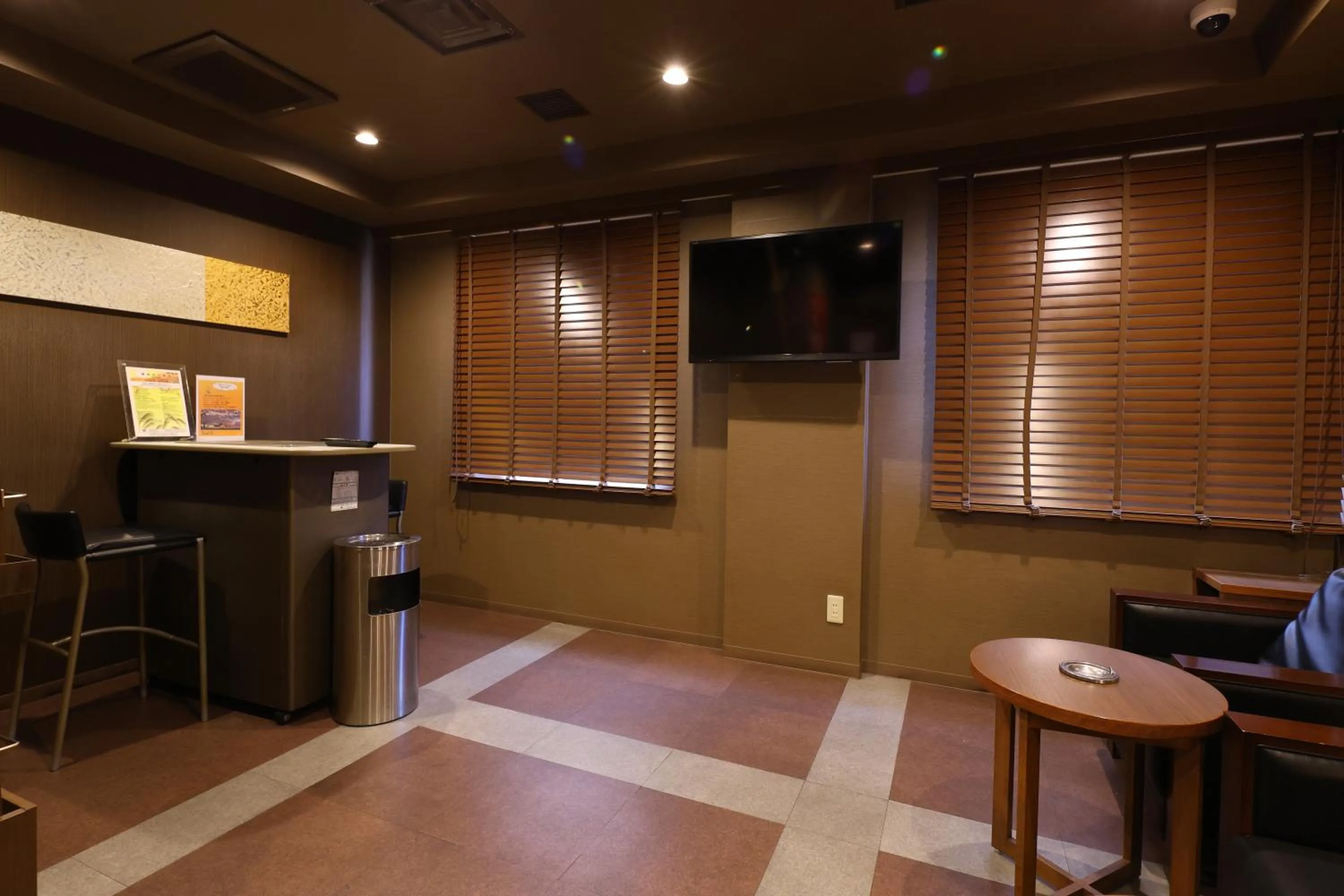 Communal lounge/ TV room in Dormy Inn Chiba City Soga