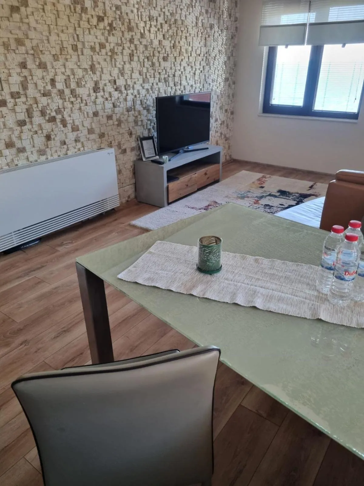 Communal lounge/ TV room in Villa Elea